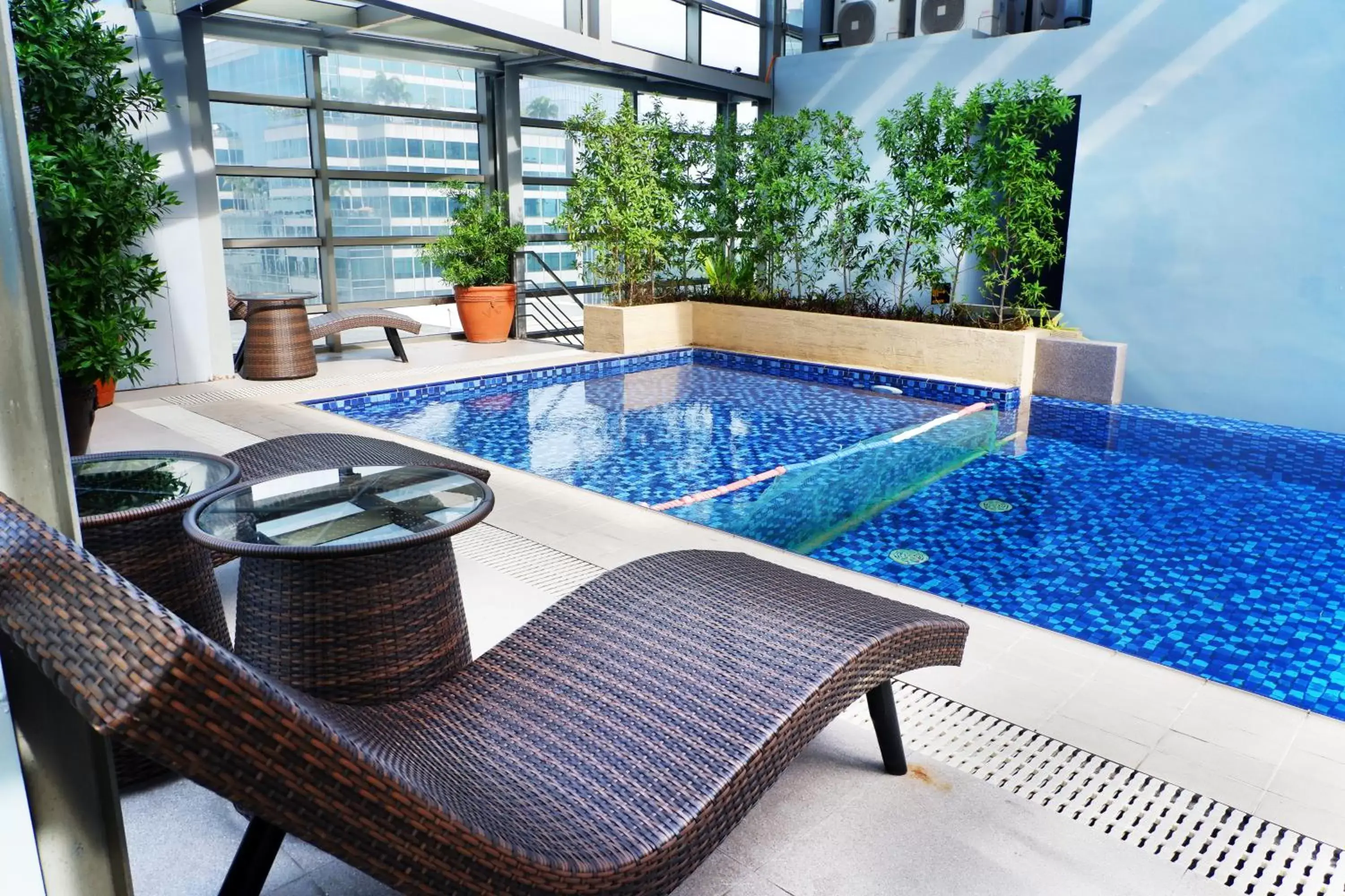 Swimming Pool in Valero Grand Suites by Swiss-Belhotel