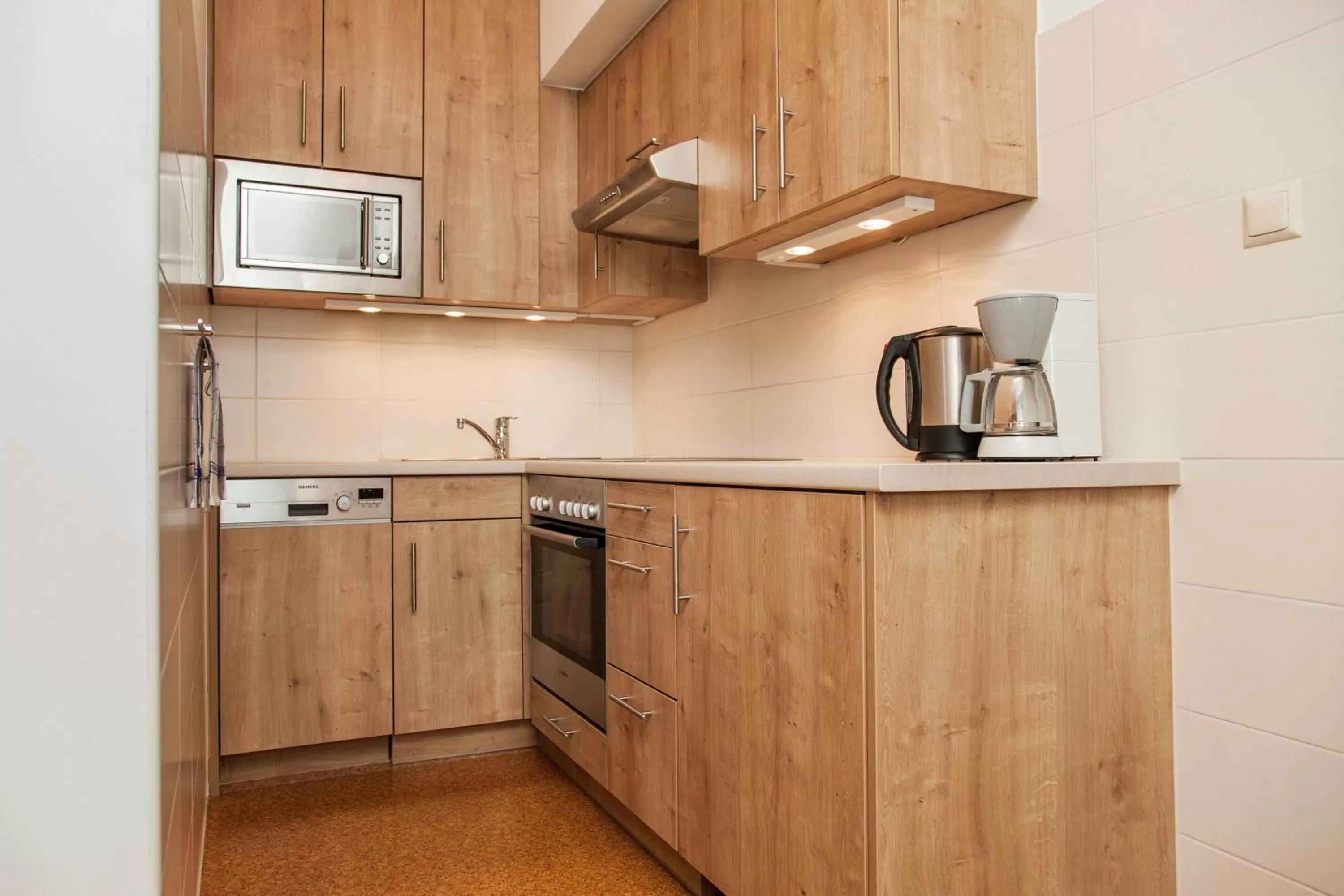 Kitchen or kitchenette in Pension Sacher - Apartments am Stephansplatz