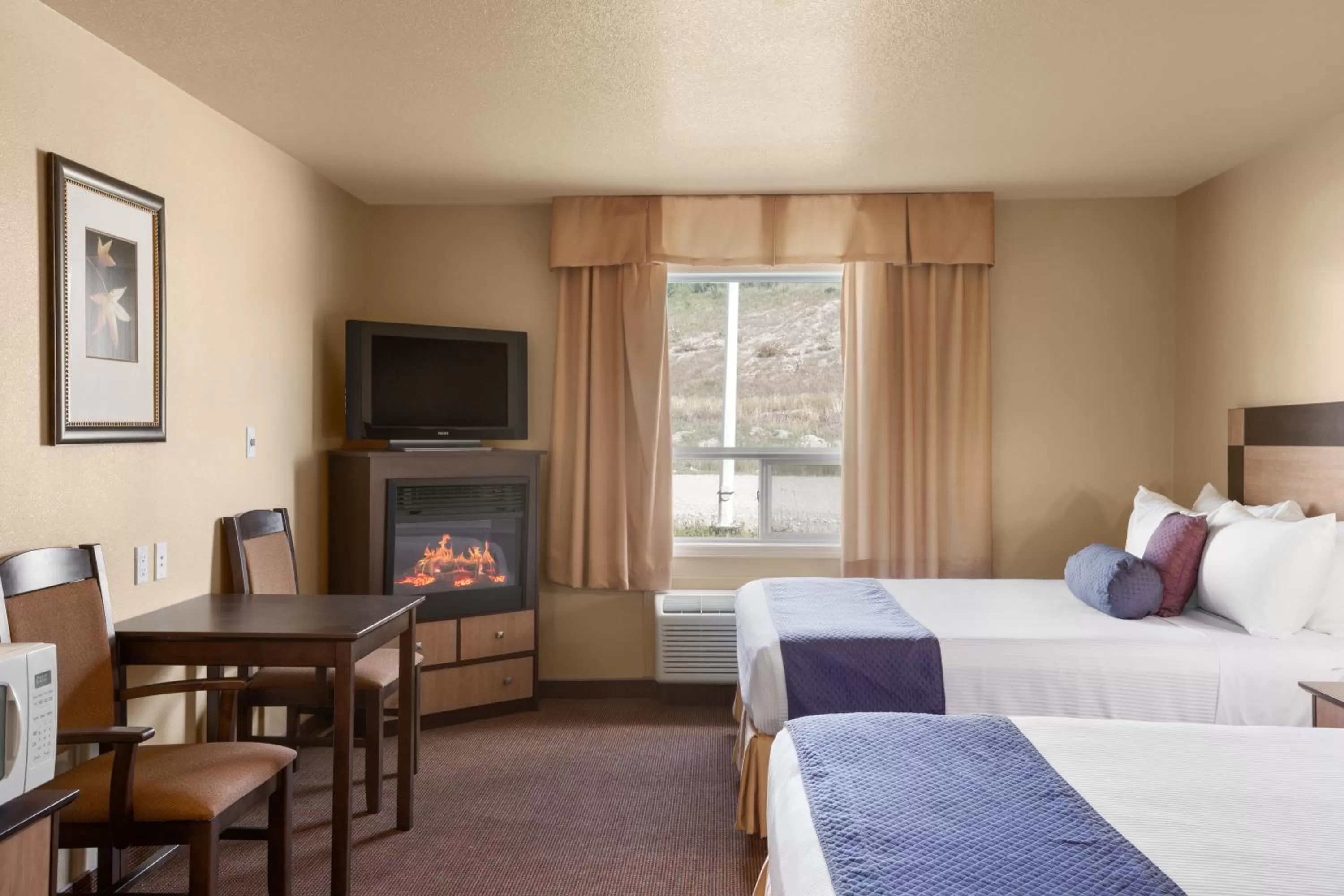 Bed in Grande Cache Inn & Suites