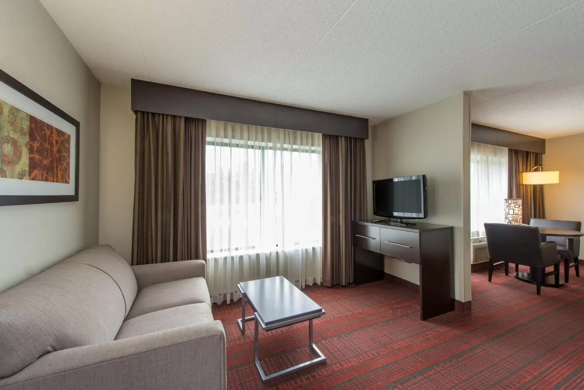 Bedroom, Seating Area in Holiday Inn Express Hotel & Suites Auburn, an IHG Hotel