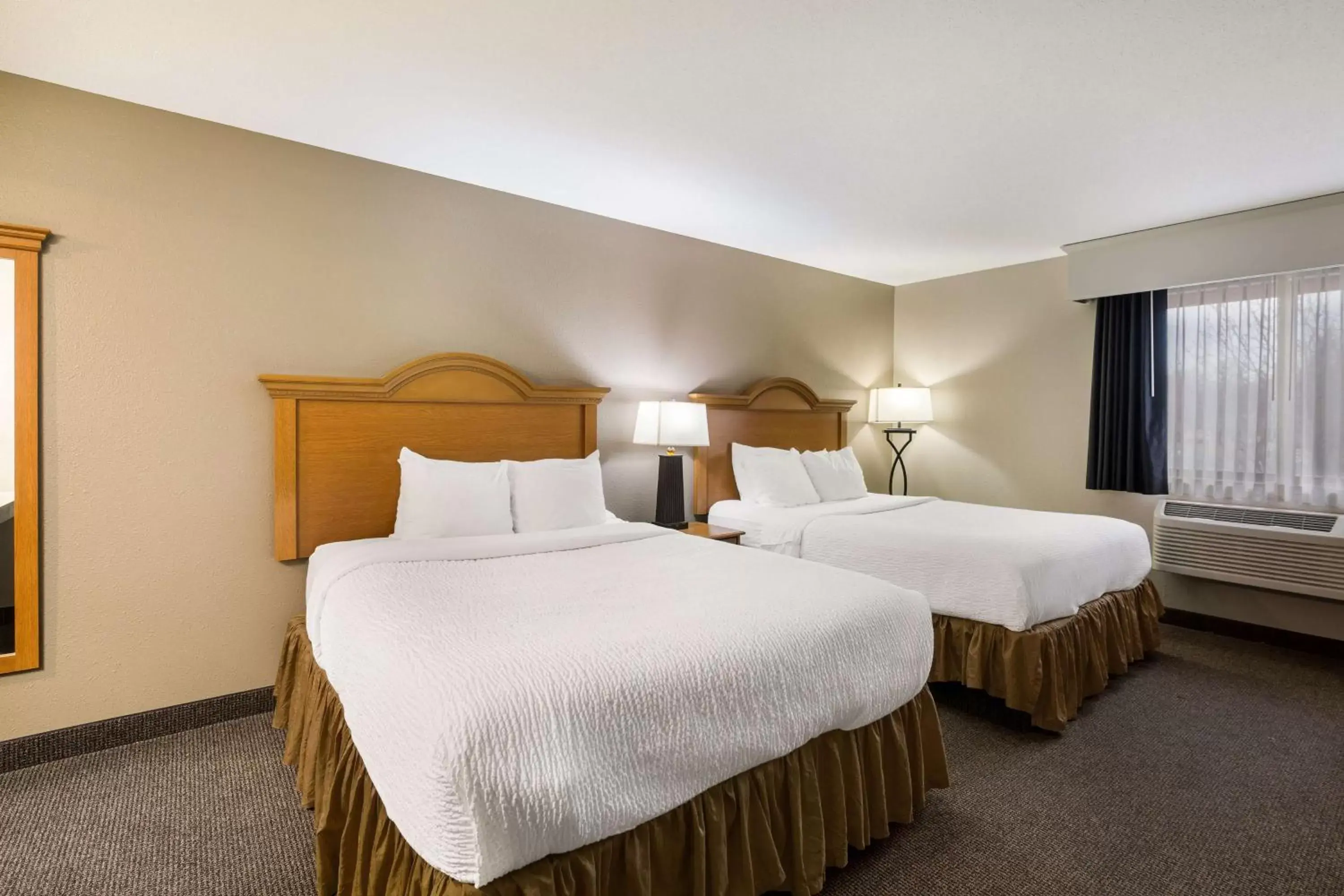 Bedroom, Bed in Revel Hotel Minot - SureStay Collection by Best Western