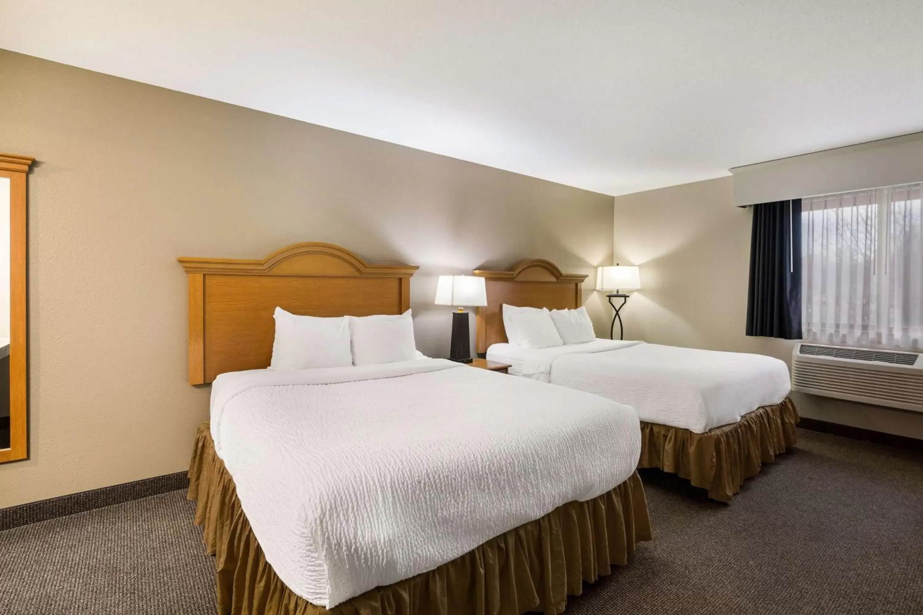 Queen Room with Two Queen Beds in Revel Hotel Minot - SureStay Collection by Best Western