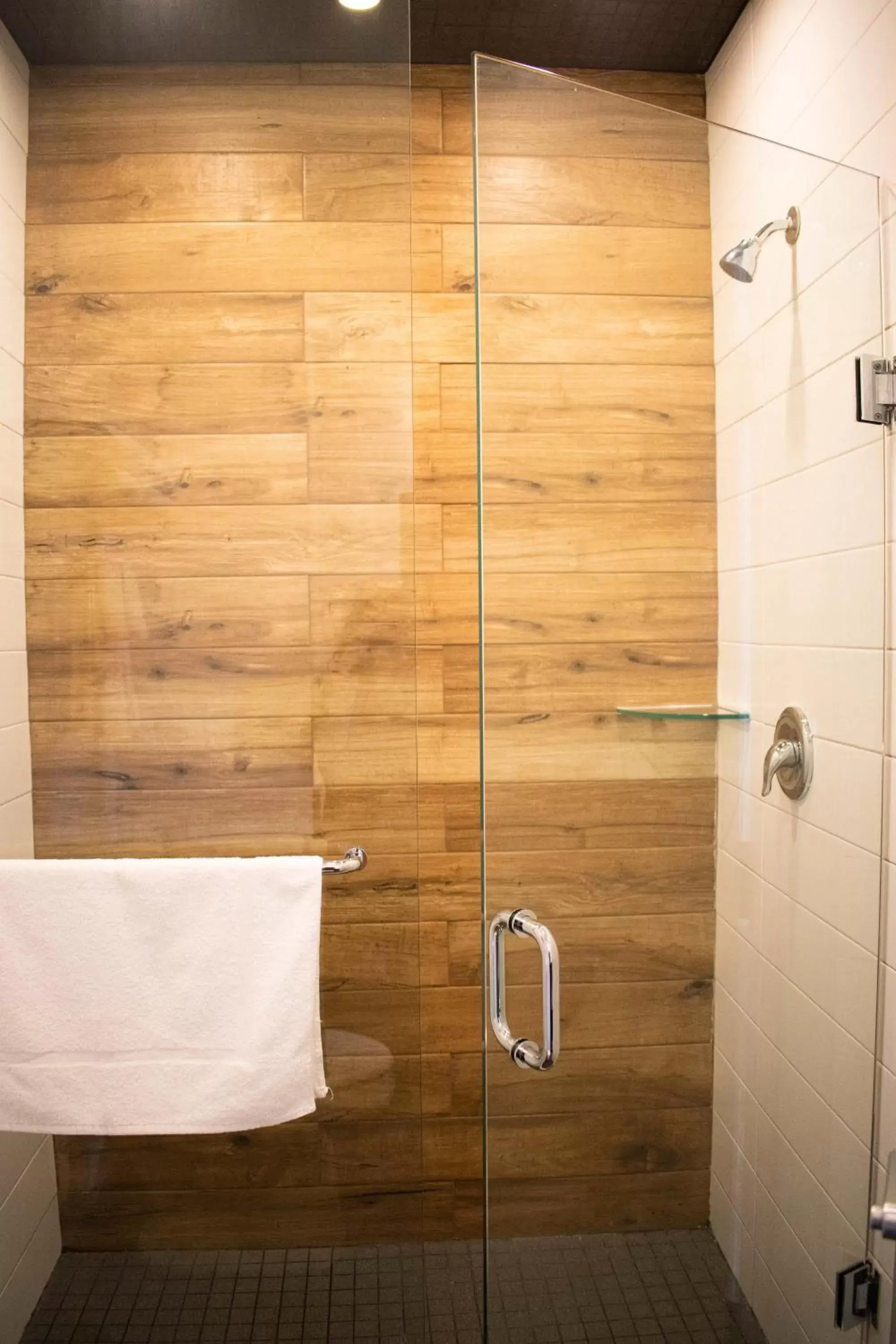 Bathroom in Colonial Hotel & Suites