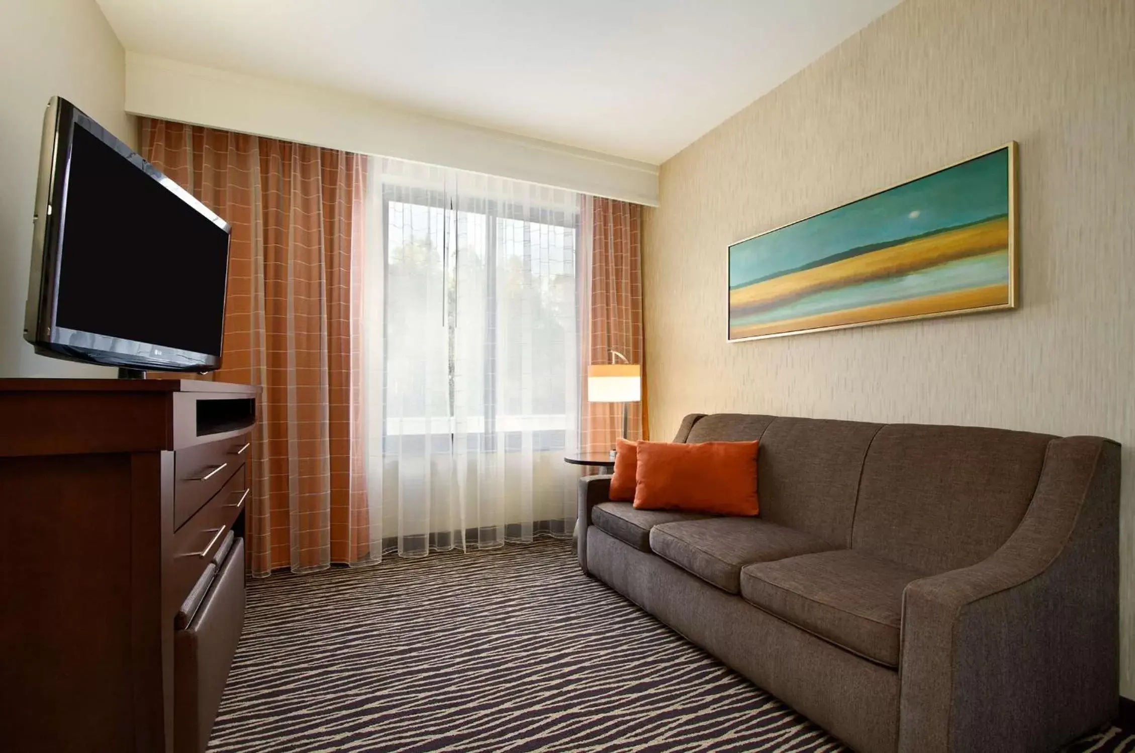 Living room, Seating Area in Embassy Suites by Hilton Fayetteville Fort Bragg