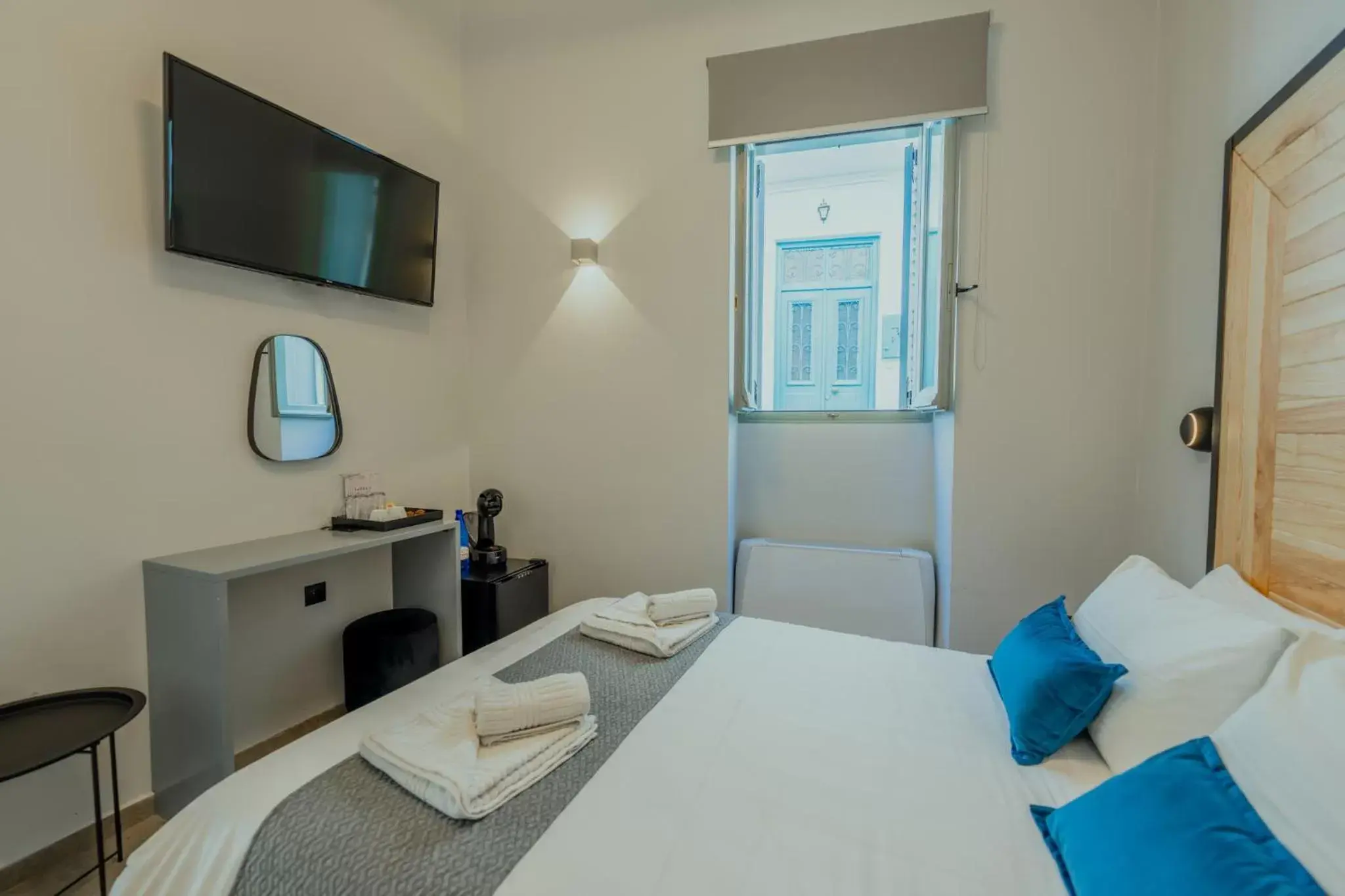 Bed in Impero Nafplio Hotel & Suites