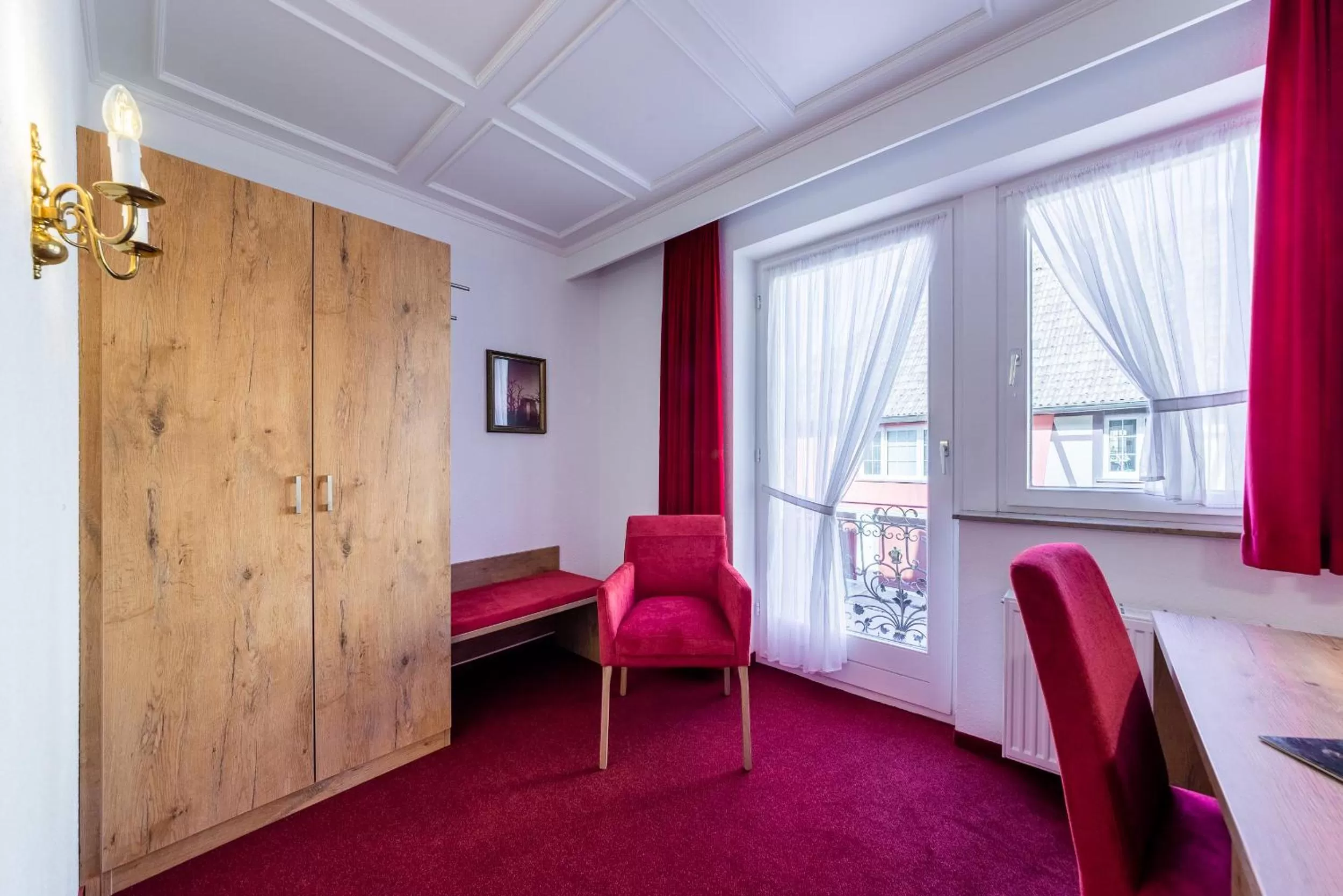 Living room, Bed in Hotel Krone