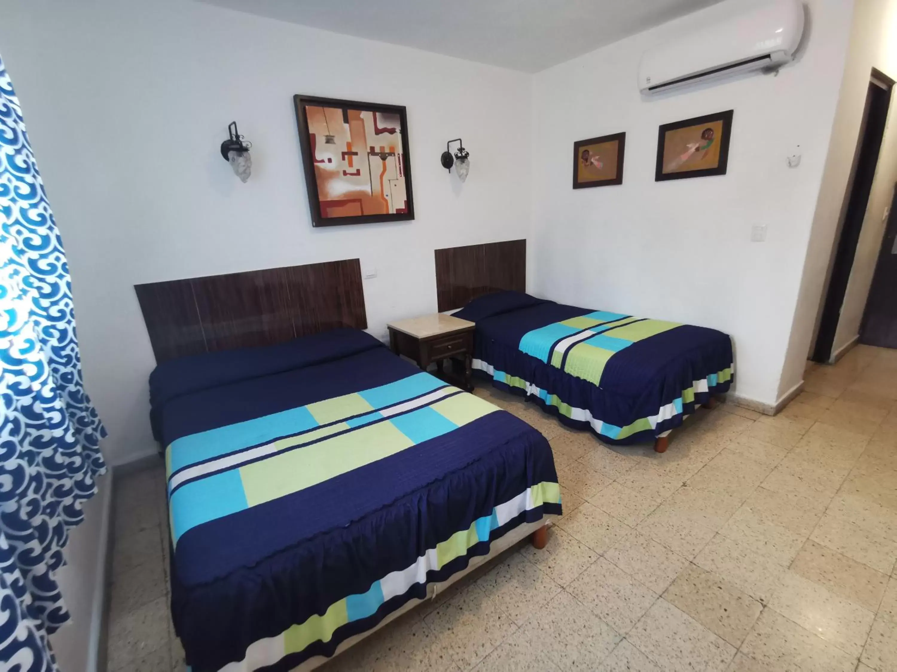 Bed in Hotel Las Dalias Inn Bed in Hotel Las Dalias Inn