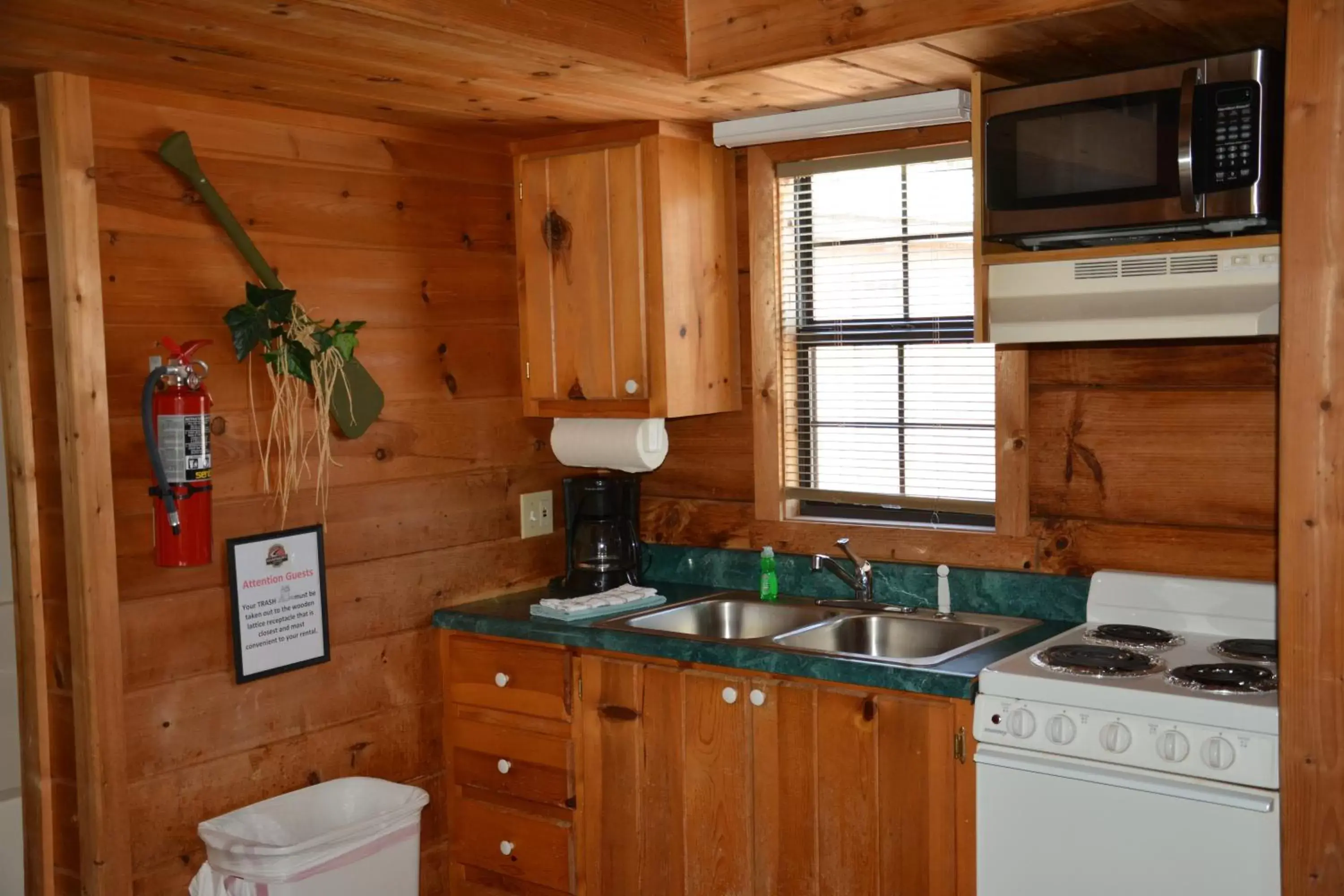 Kitchen/Kitchenette in Camp Mack, A Guy Harvey Lodge