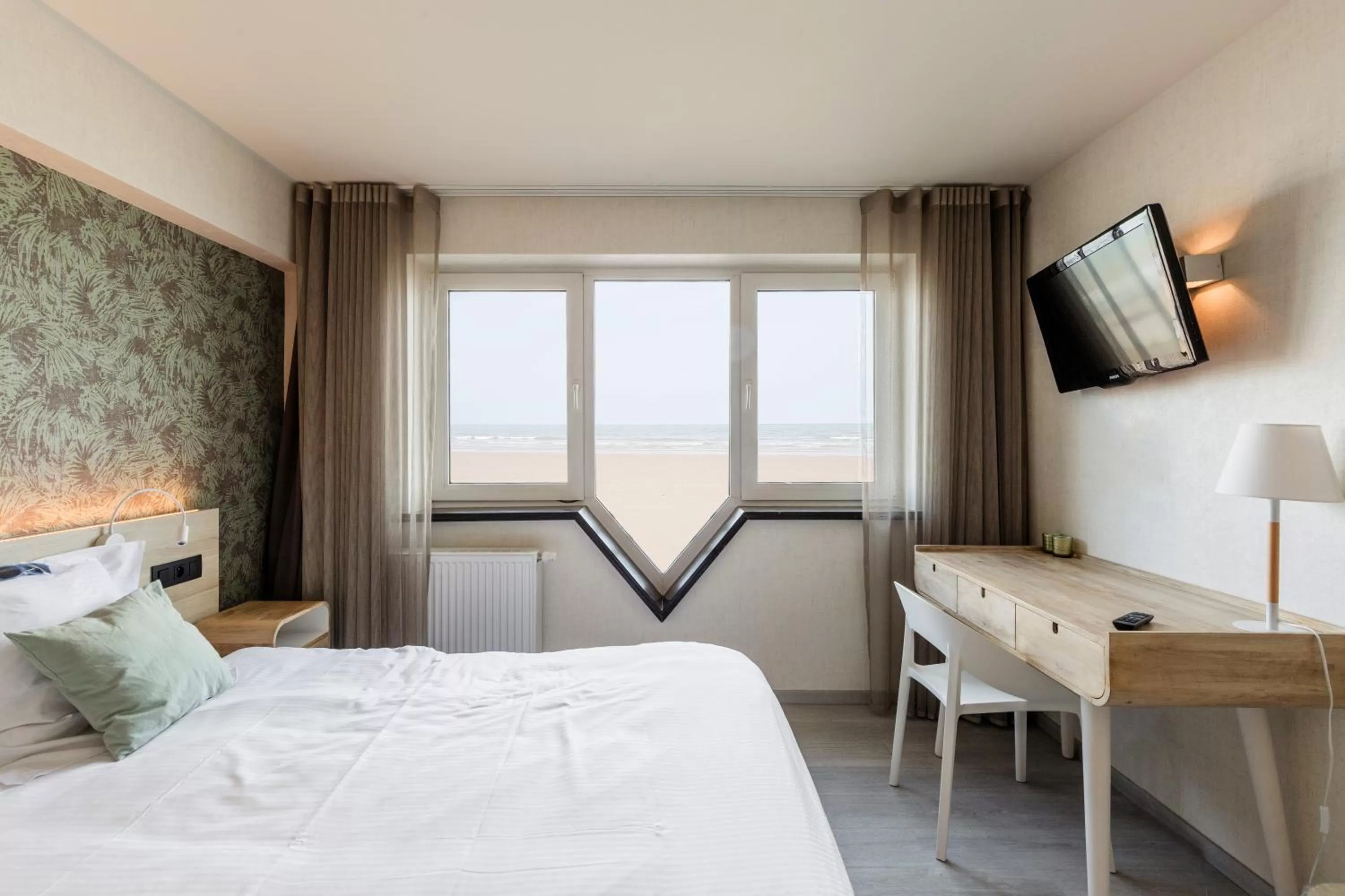 Bed in Beach Hotel Helios by CW Hotel Collection