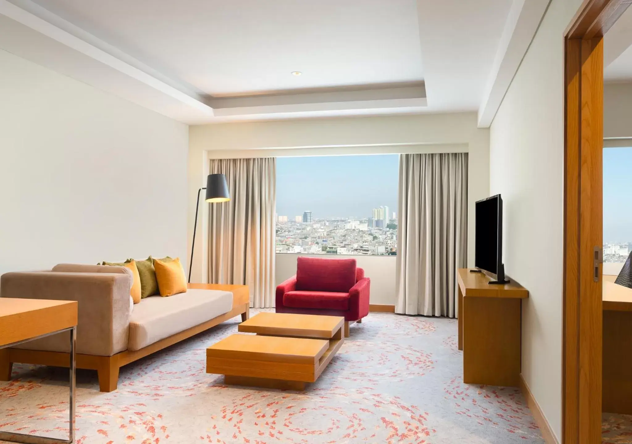 Living room, Seating Area in Holiday Inn & Suites Jakarta Gajah Mada, an IHG Hotel