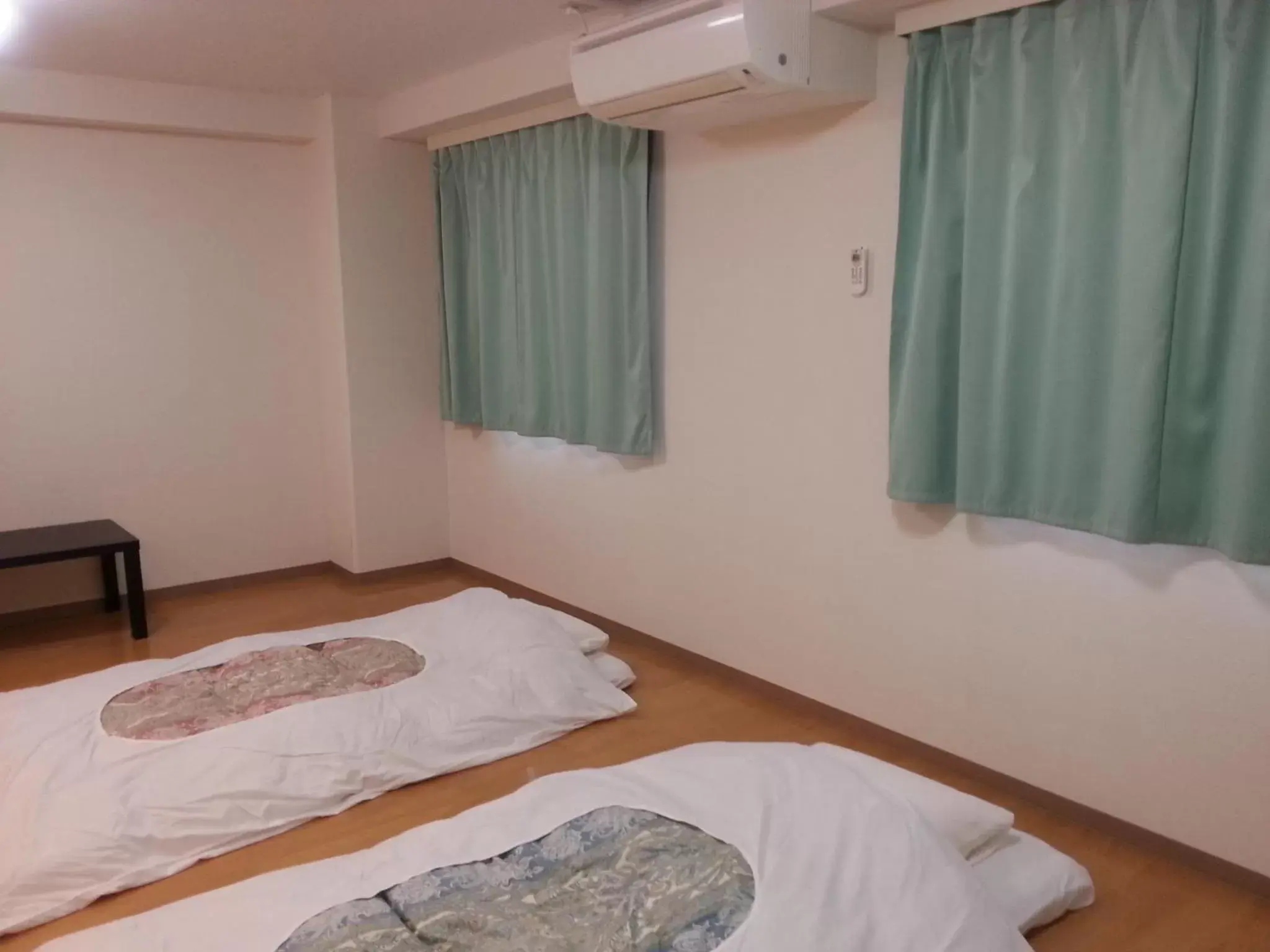 Photo of the whole room, Bed in Kagoshima Daiichi Hotel Kishaba