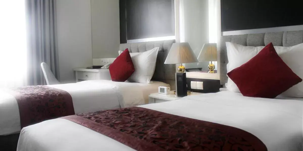 Photo of the whole room, Bed in Gino Feruci Braga by KAGUM Hotels