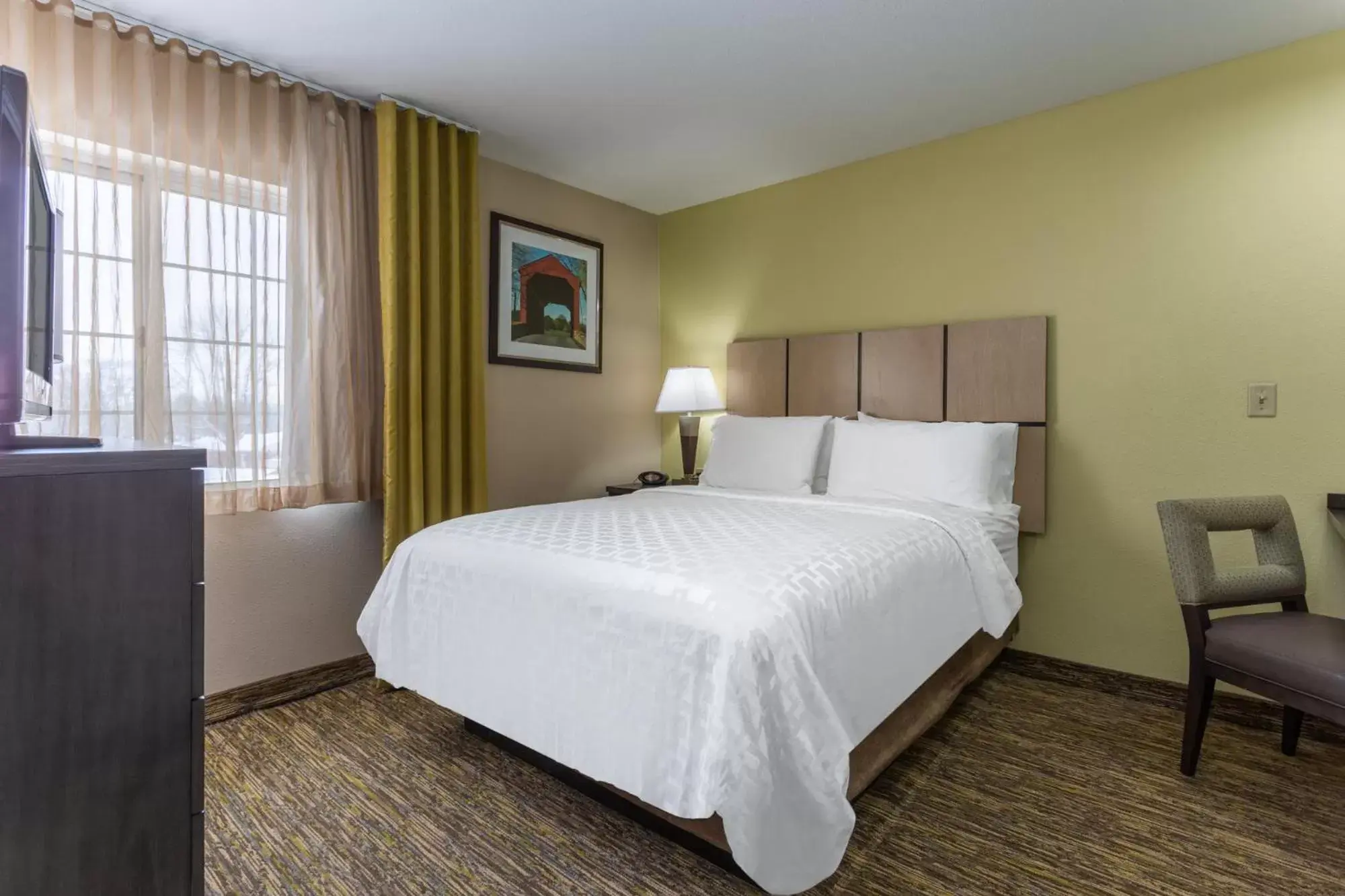 Bedroom, Bed in Candlewood Suites South Bend Airport, an IHG Hotel