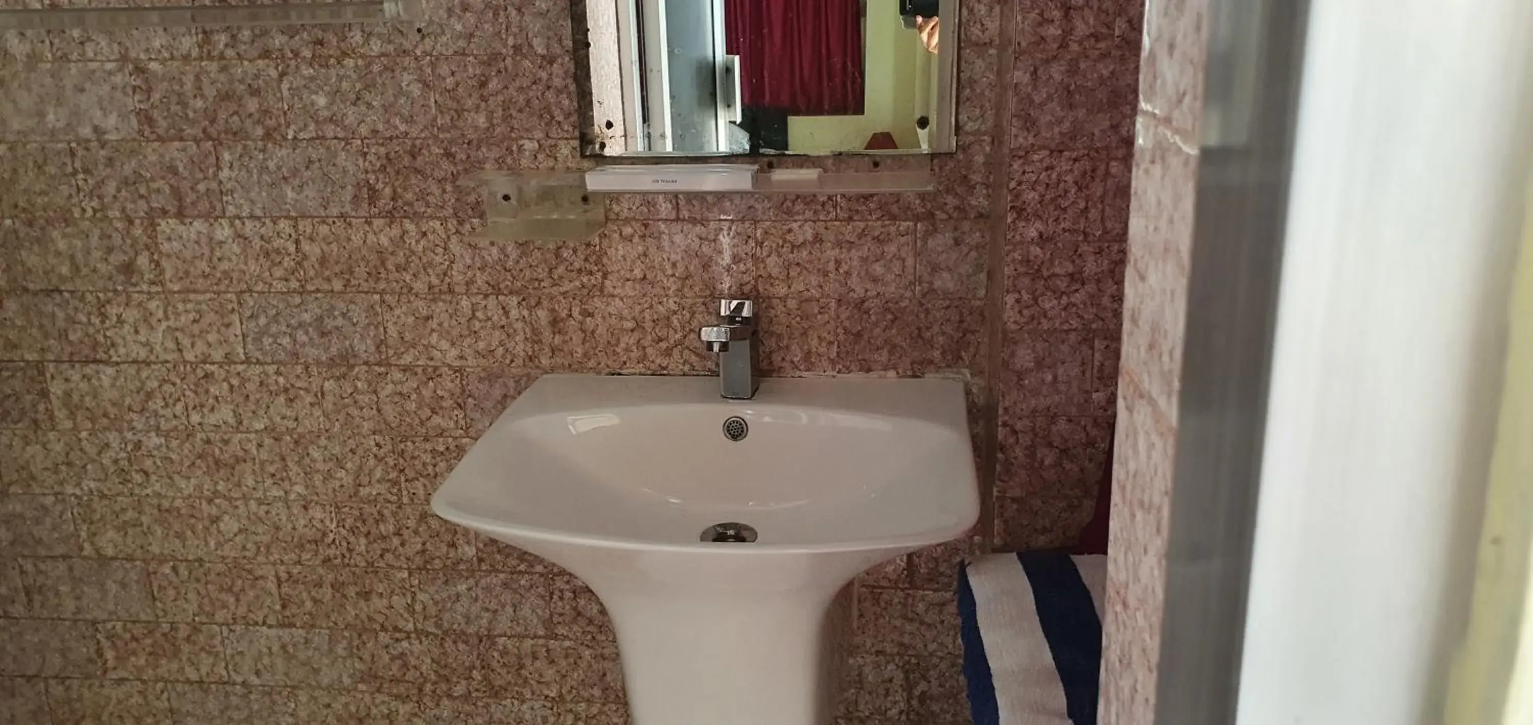Bathroom in Gandhara Hotel