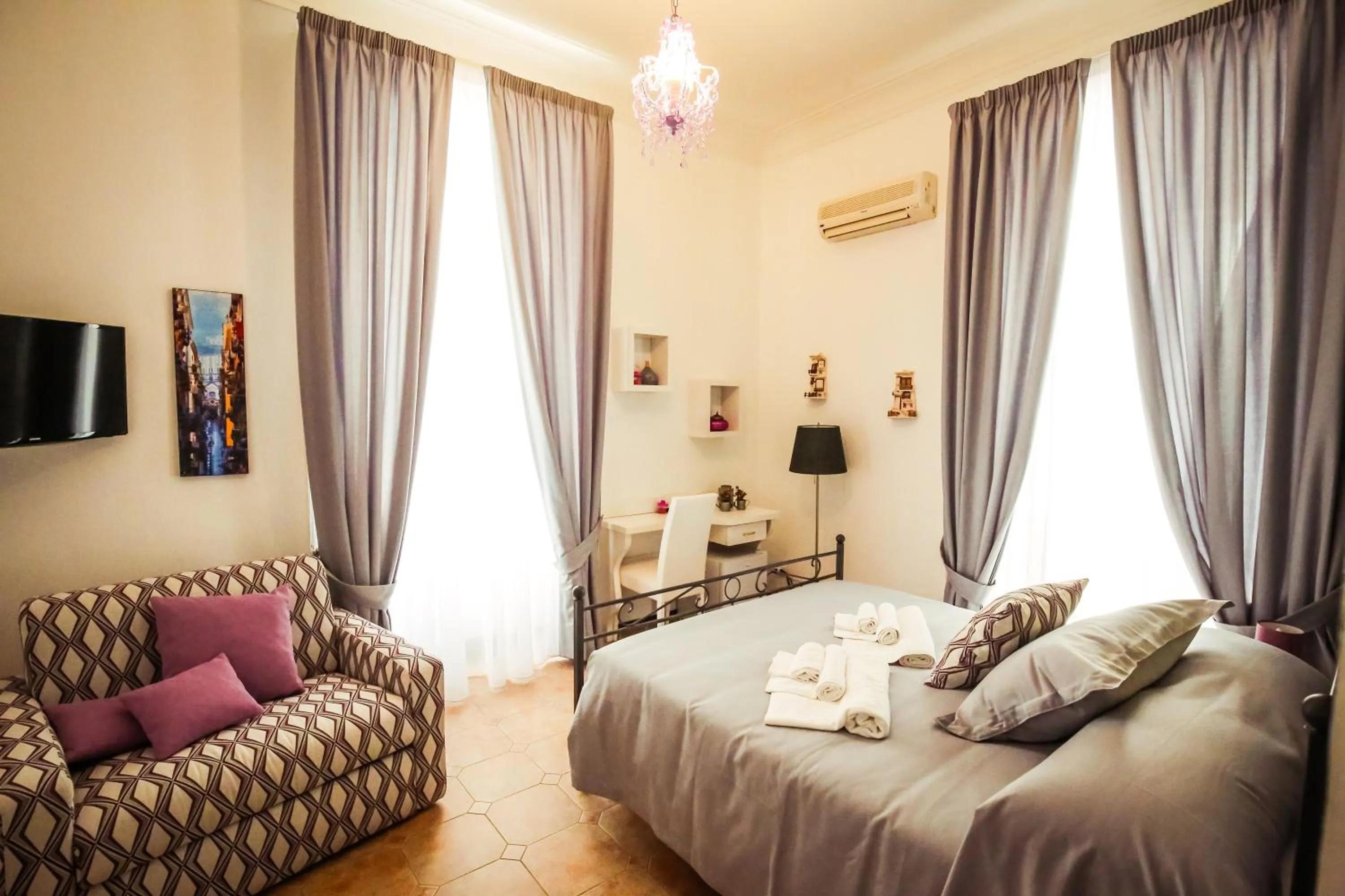 Bed in NapoliMia Boutique Hotel