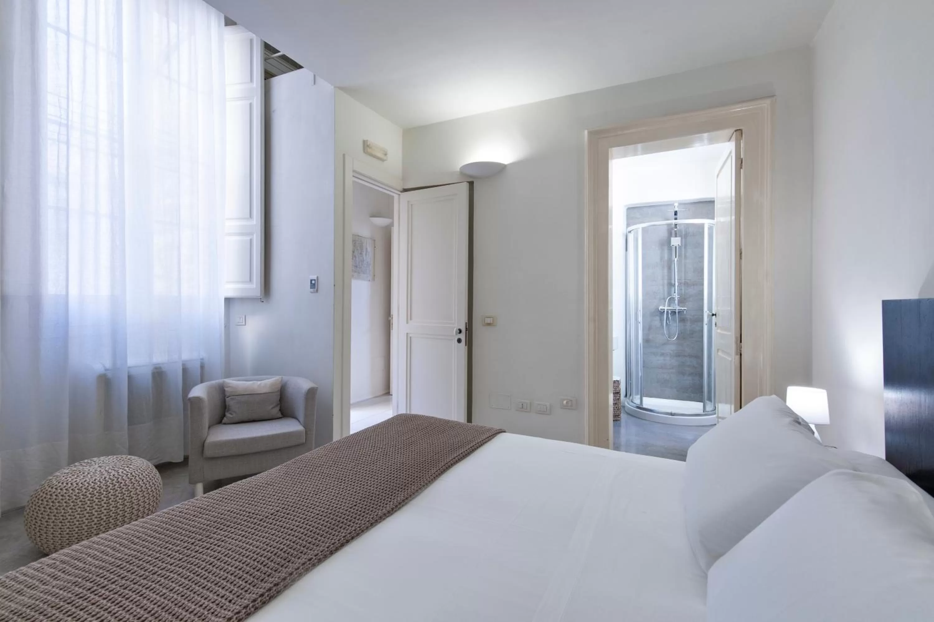 Bed in Casa di Lo Suites