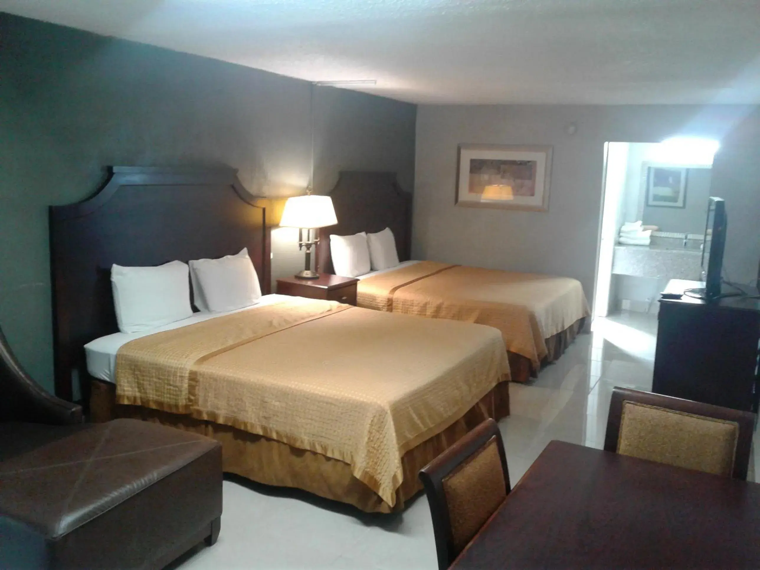 Bed in Express Inn & Suites - 5 Miles from St Petersburg Clearwater Airport