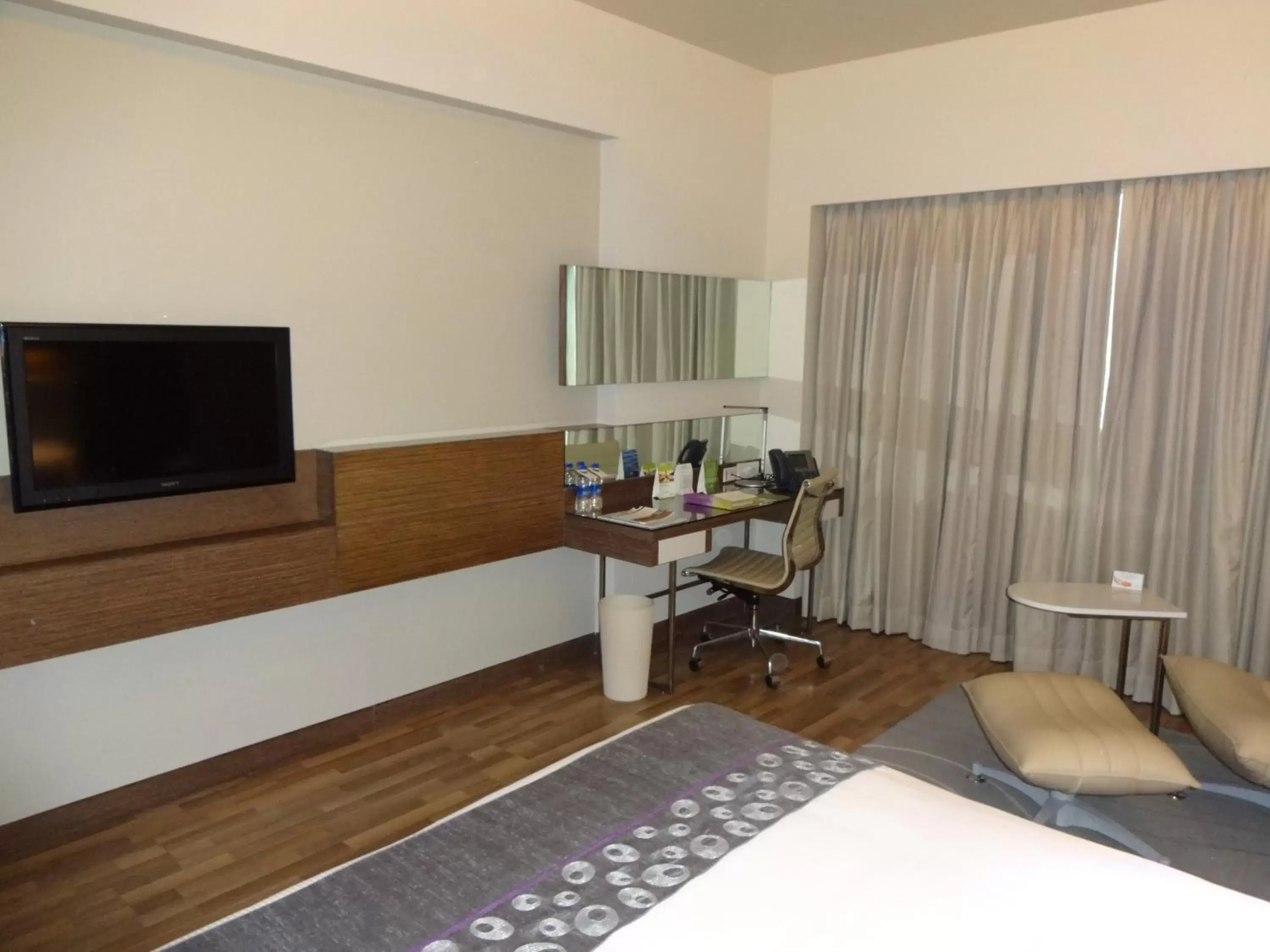 Bed, TV/Entertainment Center in The Raintree, Anna Salai