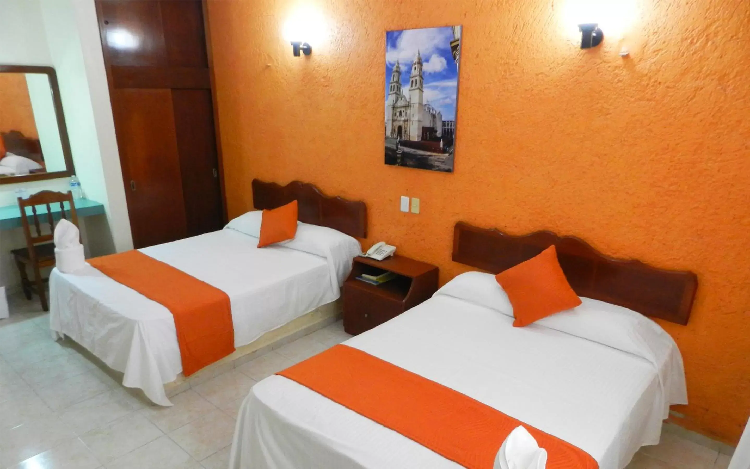 Bed in Hotel Uxulkah