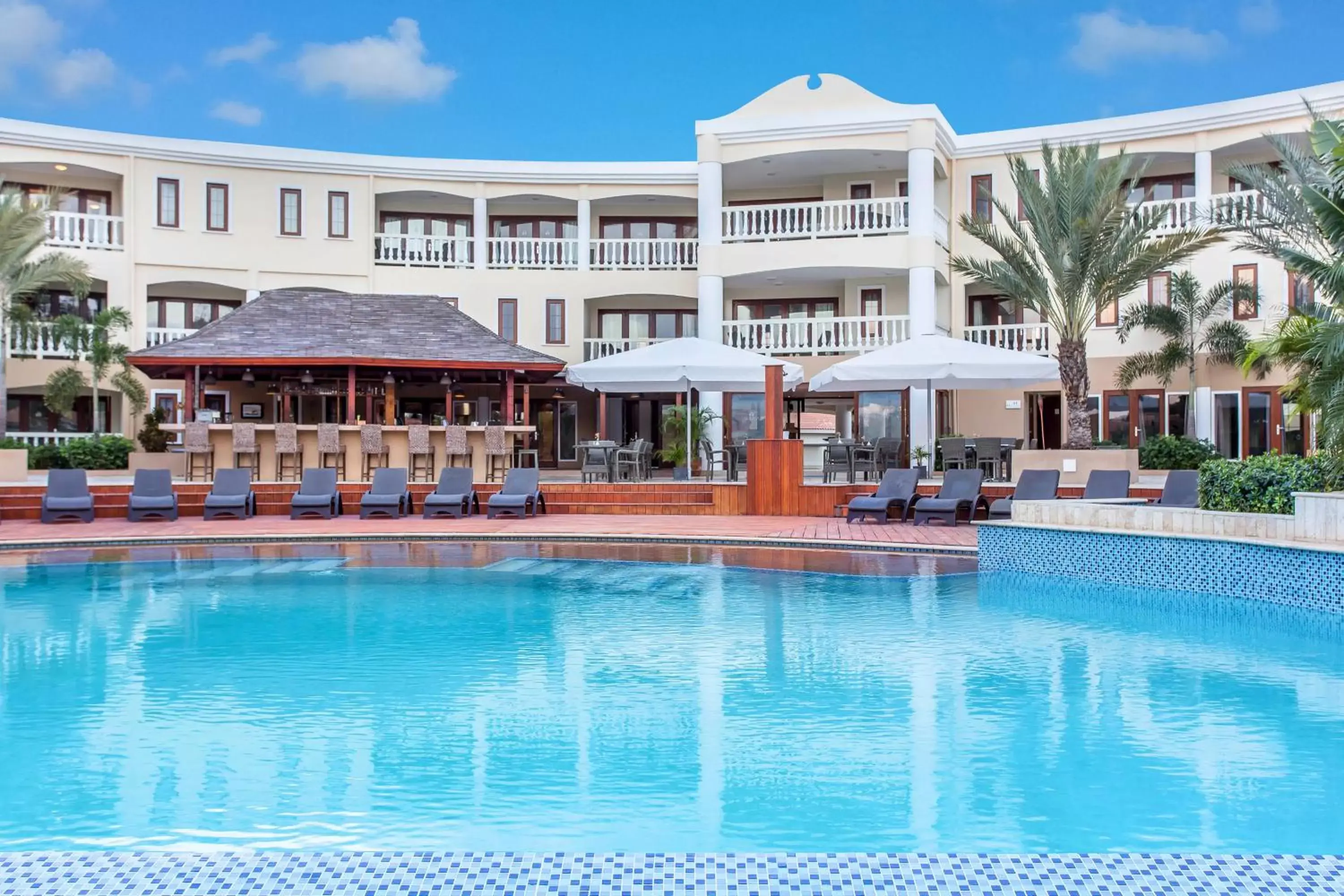 Swimming pool, Property Building in Acoya Curacao Resort, Villas & Spa