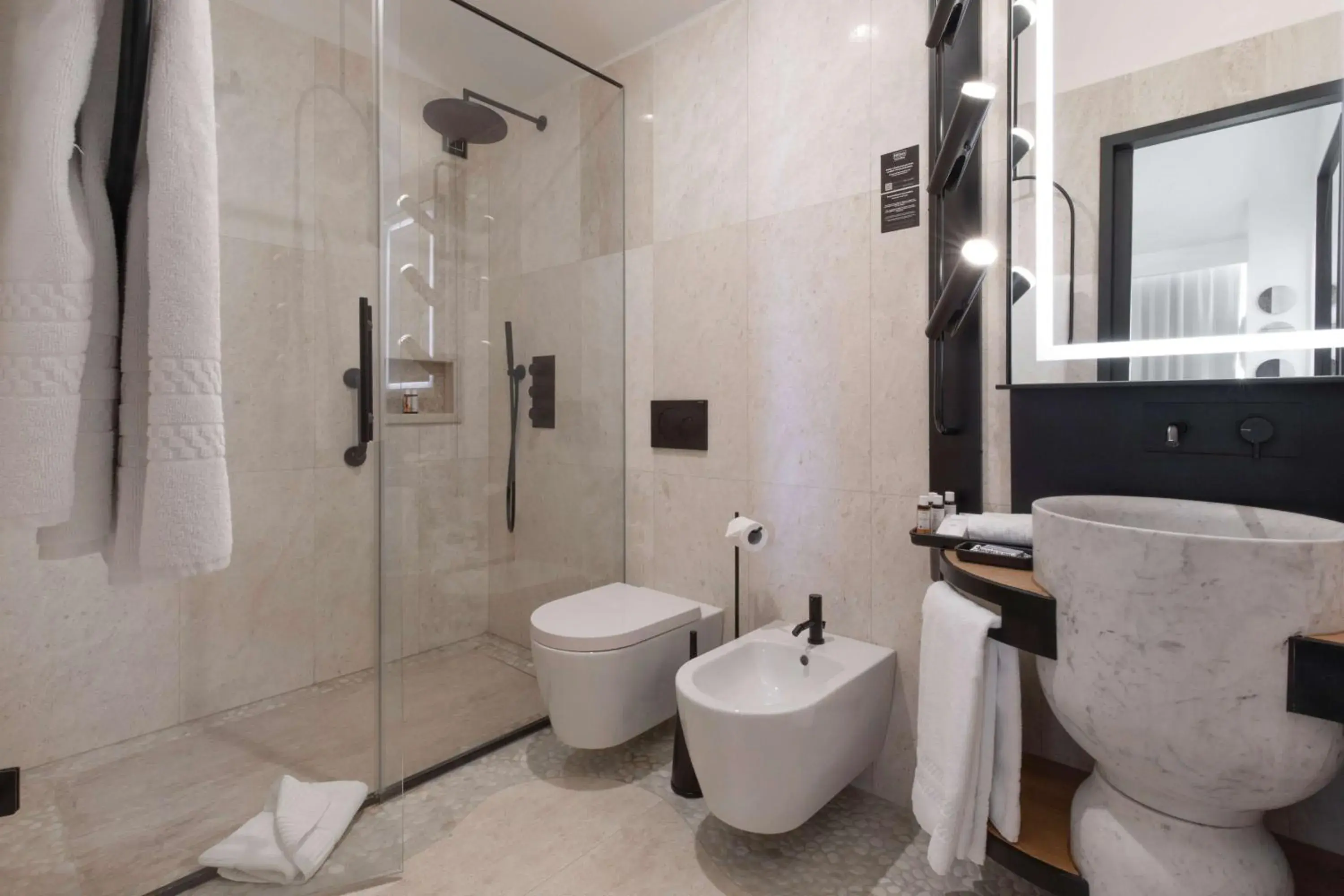 Bathroom in Sulia House Porto Rotondo, Curio Collection by Hilton