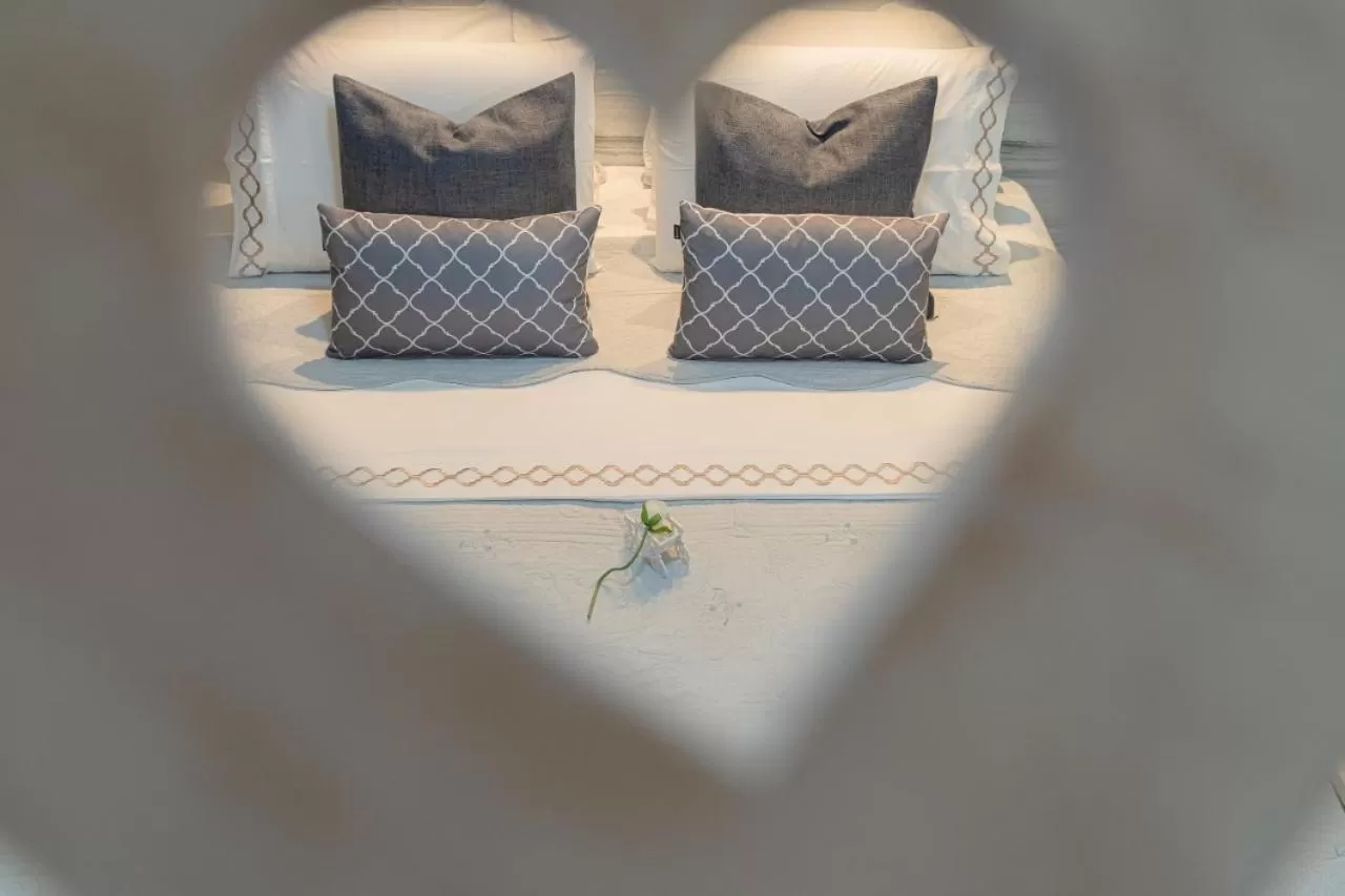 Bed in Pousada Recanto da Família