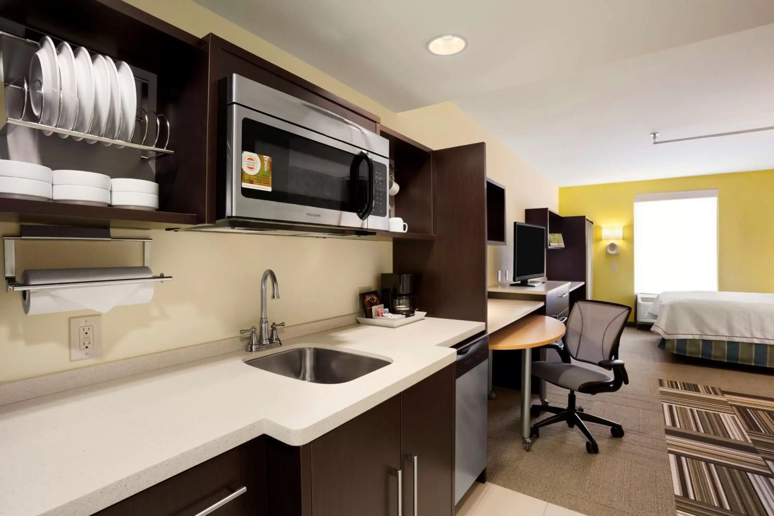 Bedroom, Kitchen/Kitchenette in Home2 Suites by Hilton Greensboro Airport