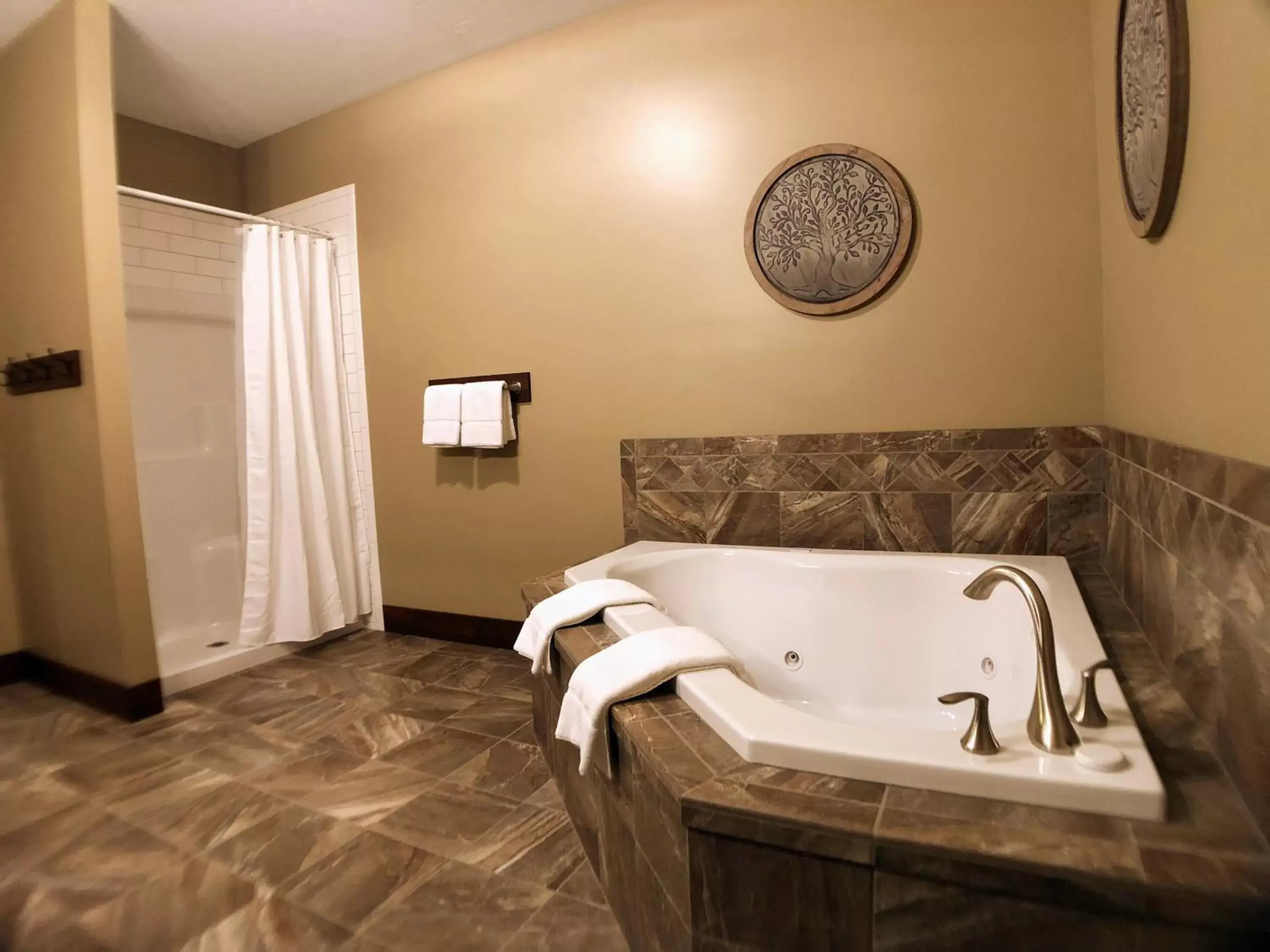 Bathroom in Sojourner's Lodge & Log Cabin Suites