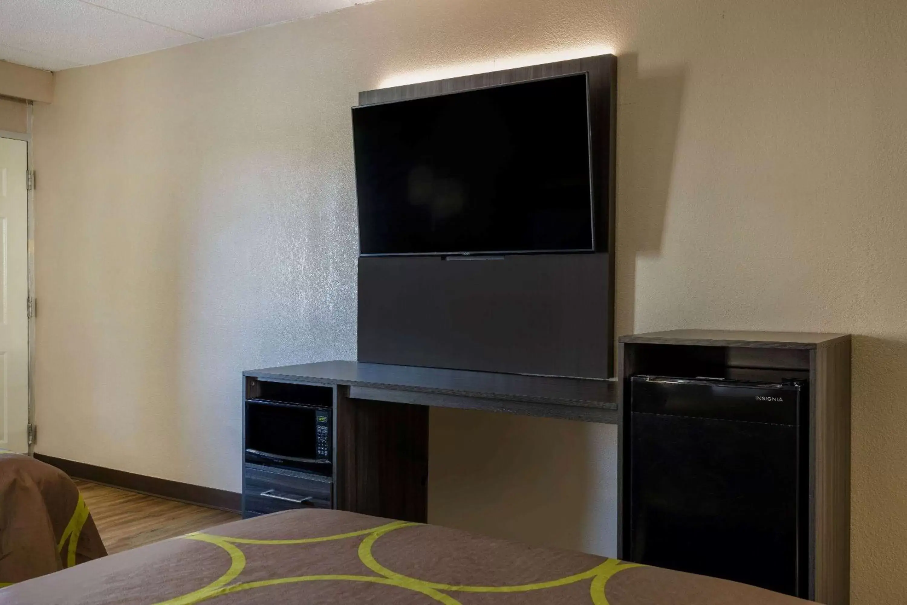 Photo of the whole room, TV/Entertainment Center in Super 8 by Wyndham McDonough GA