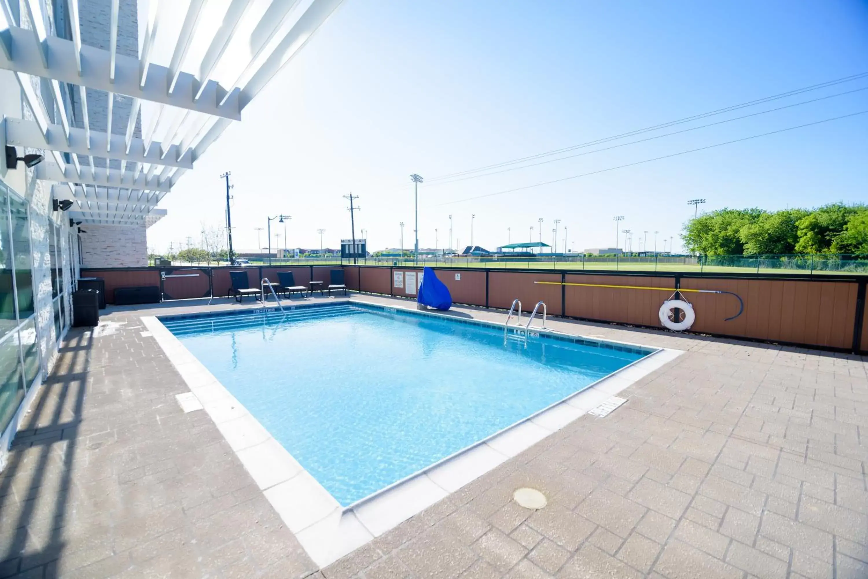 Swimming Pool in Holiday Inn Express & Suites McKinney - Frisco East, an IHG Hotel