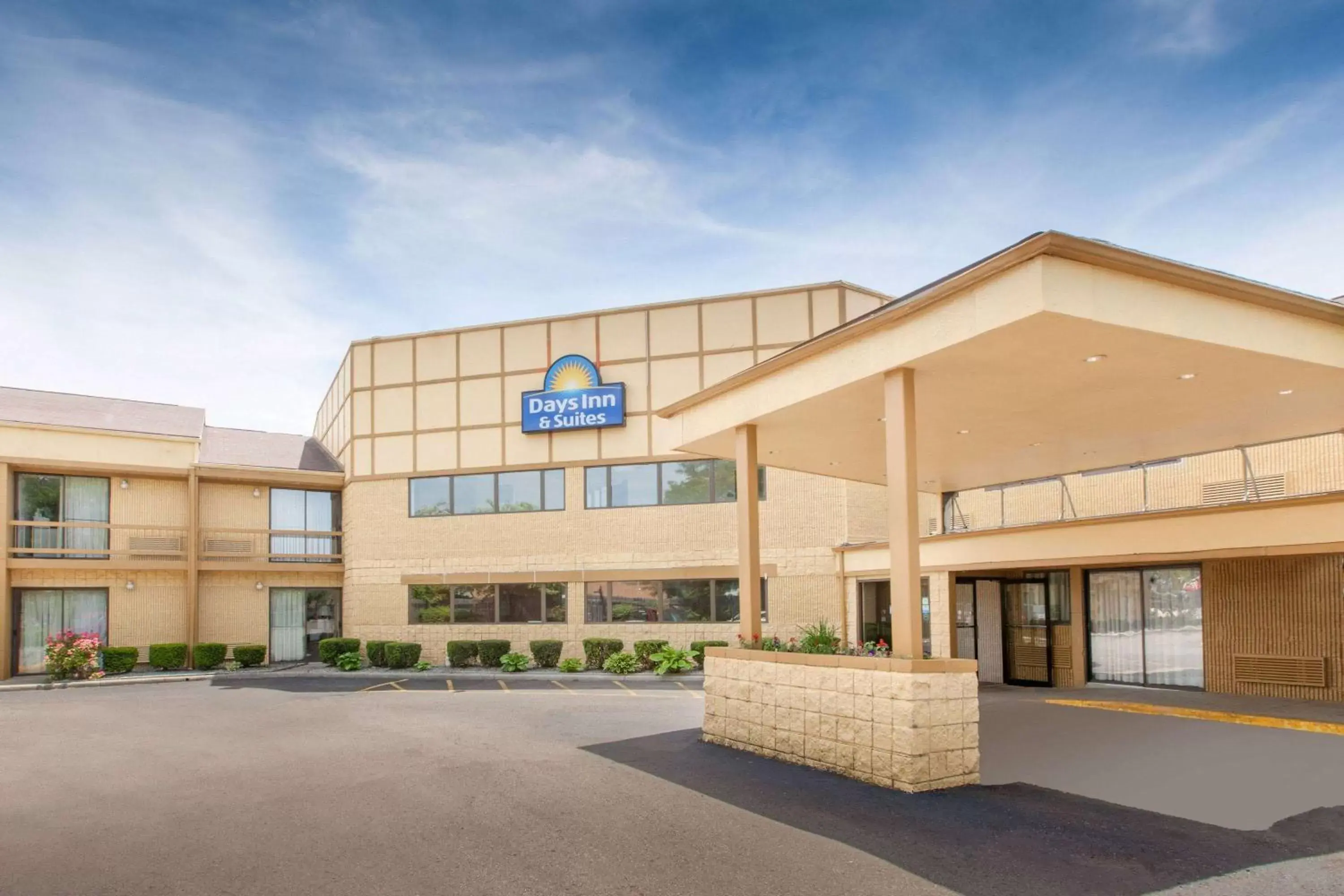 Property Building in Days Inn & Suites by Wyndham Madison Heights MI