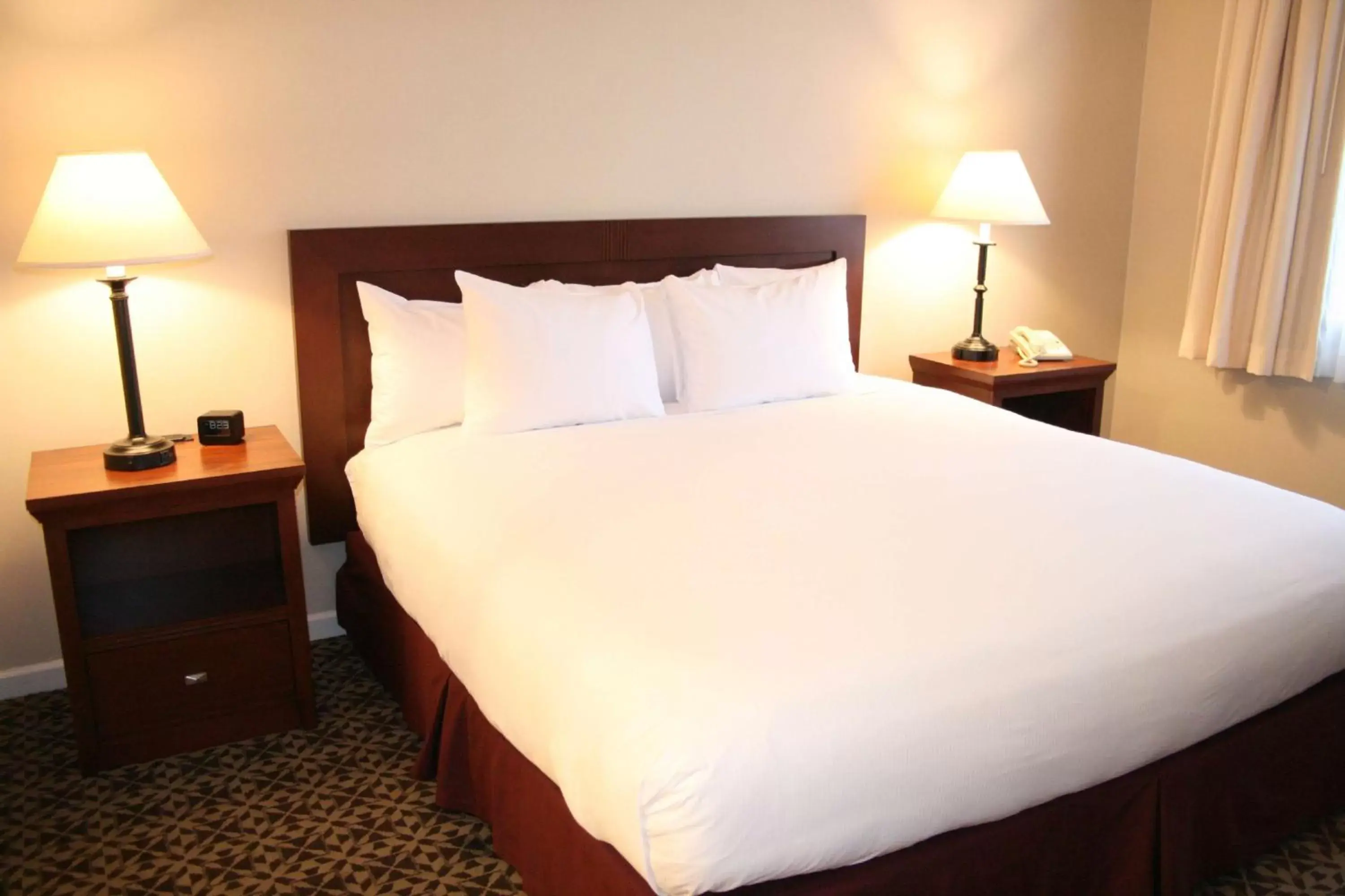 Bed in DoubleTree Suites by Hilton Mount Laurel