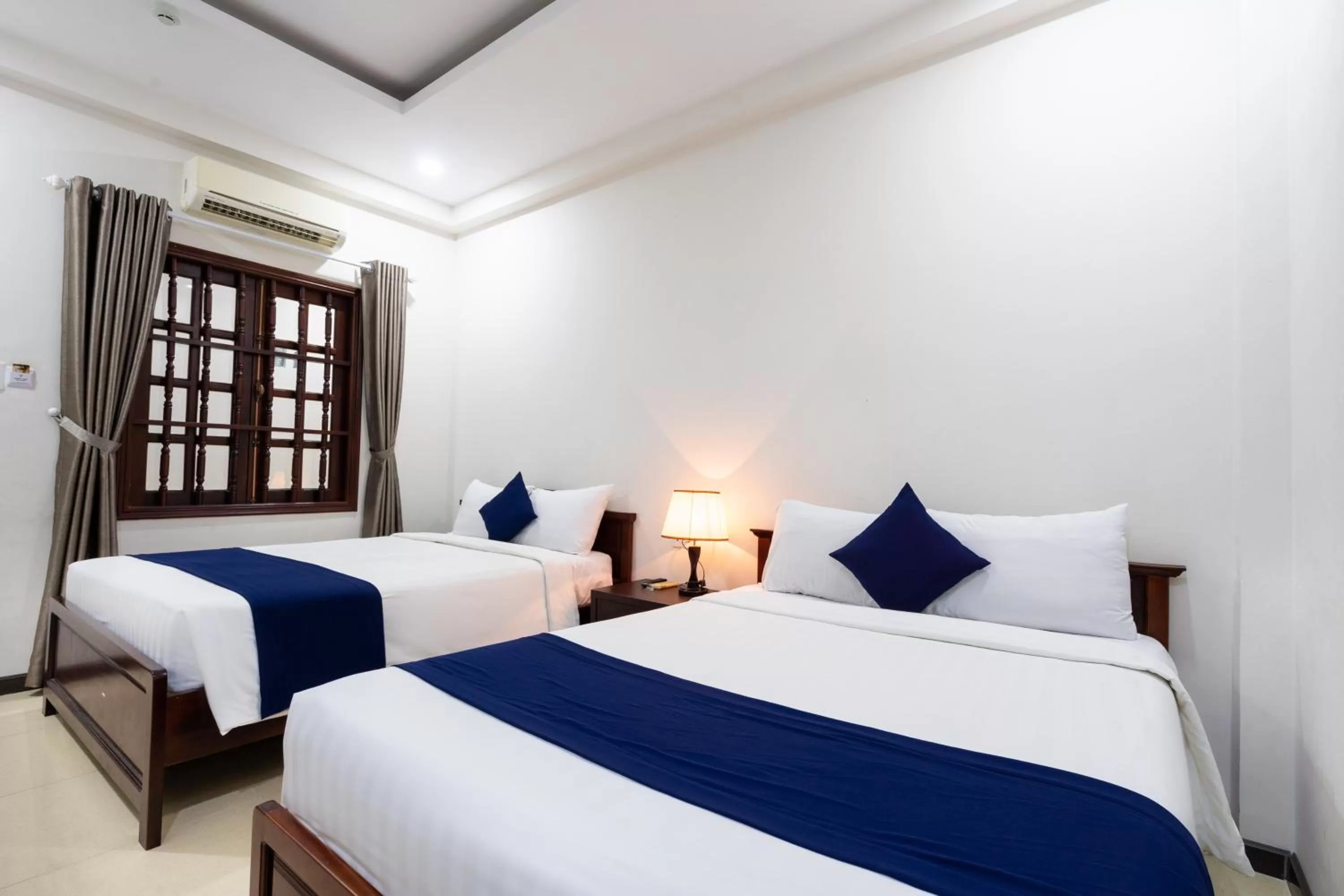 Bed in Central Hotel by Joi Hospitality