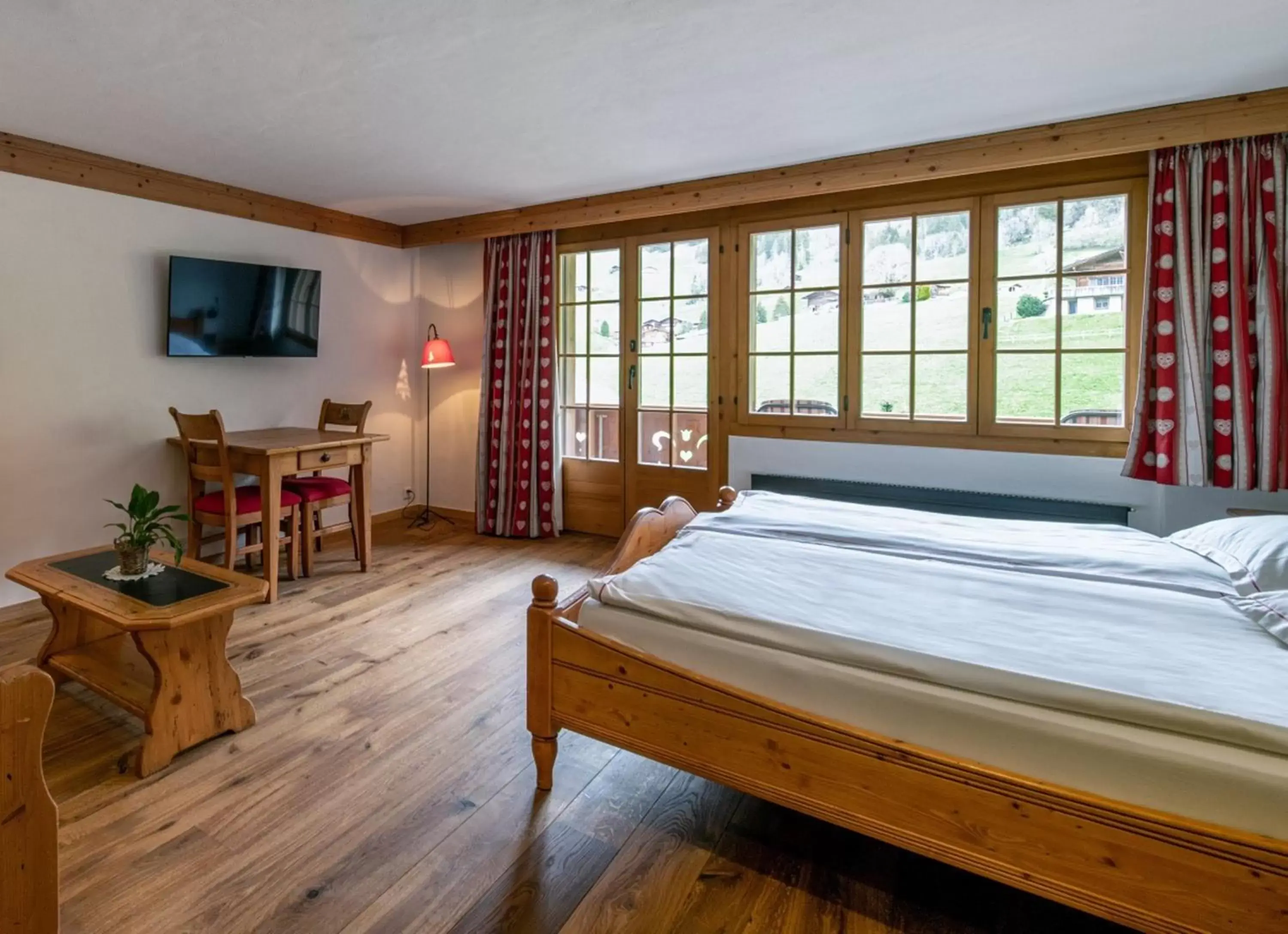 Photo of the whole room, Bed in Geniesserhotel Le Grand Chalet