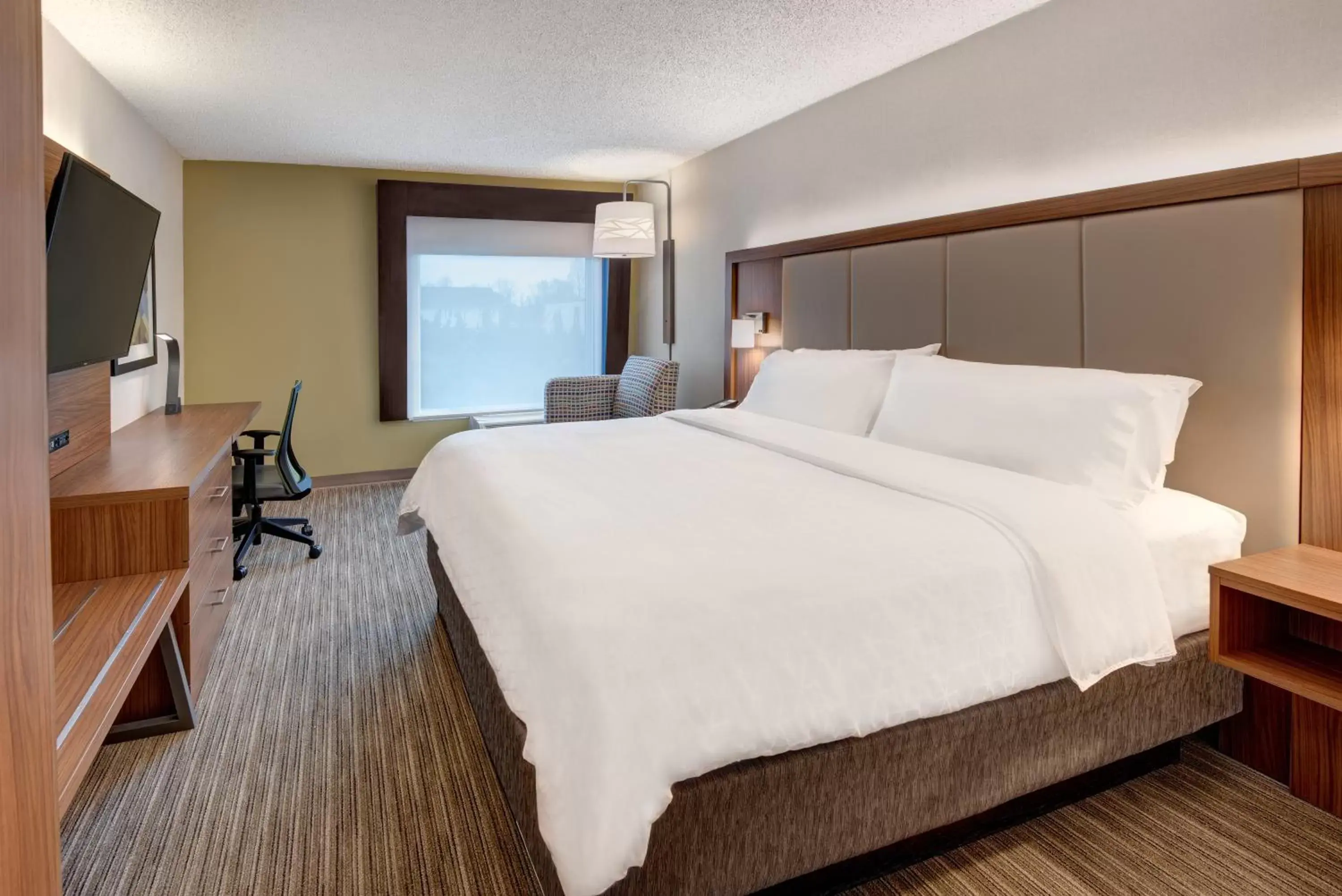 Bedroom in Holiday Inn Express & Suites West Long Branch - Eatontown, an IHG Hotel