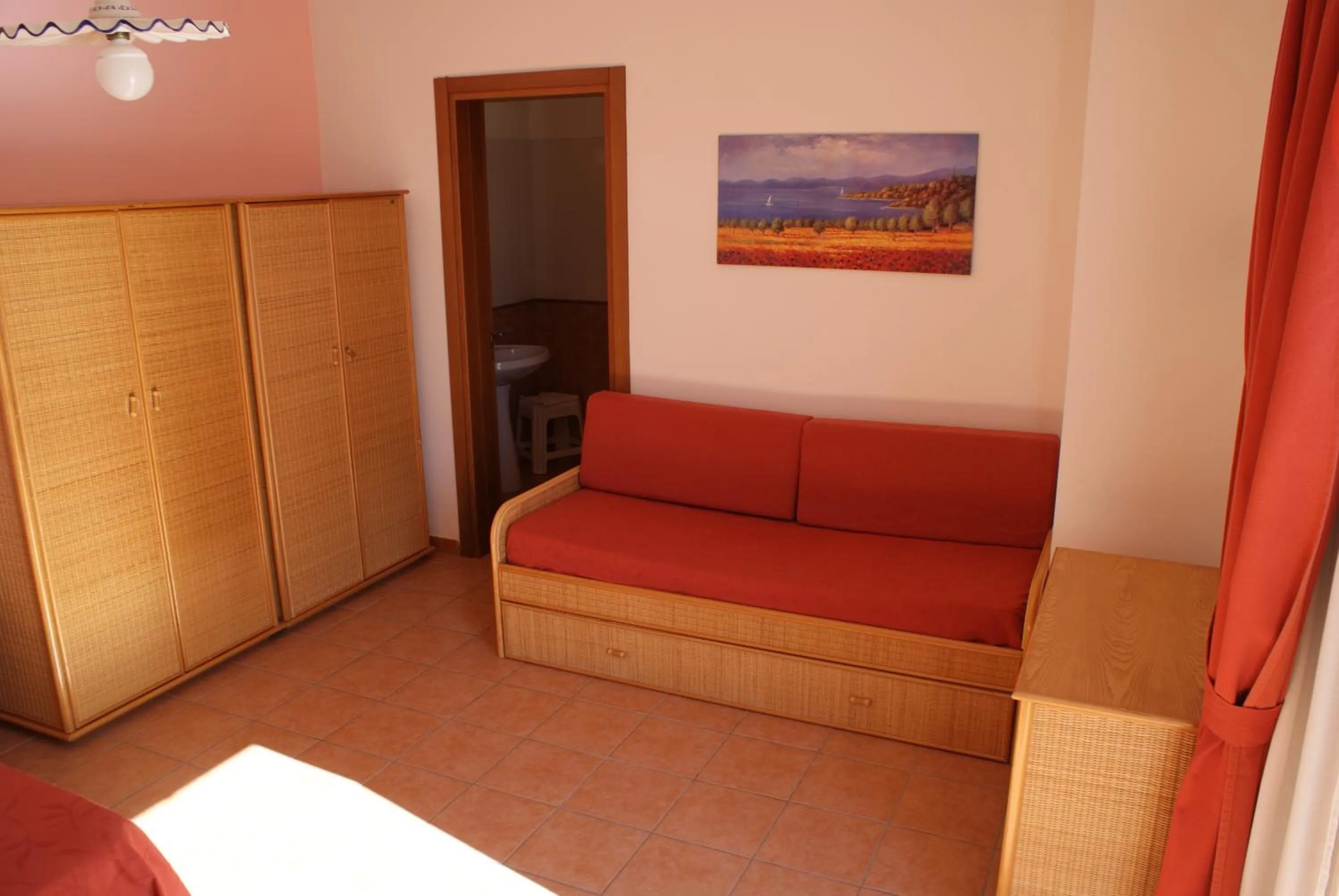 Seating area, Bed in Messapia Hotel & Resort