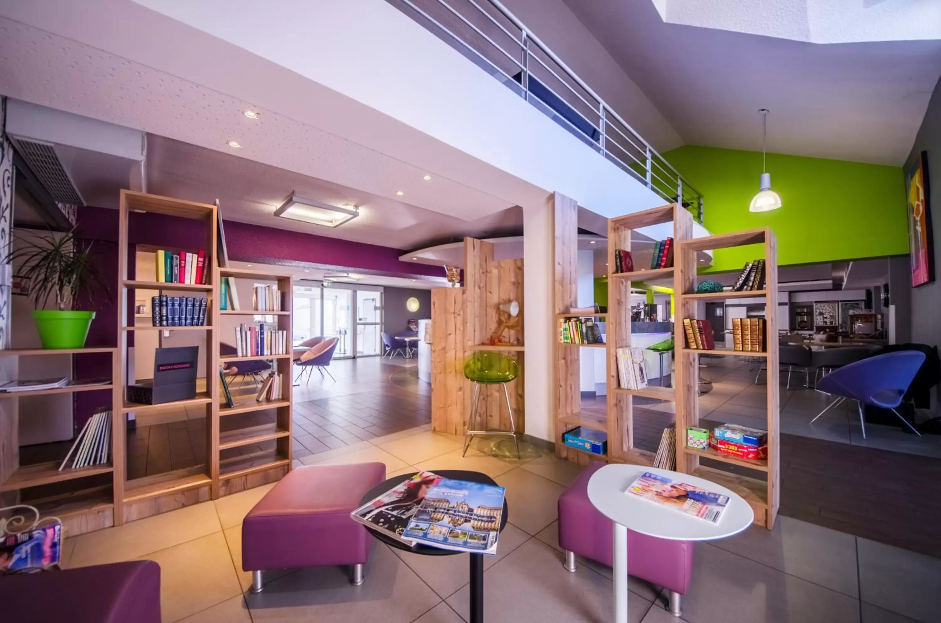 Communal lounge/ TV room in ibis styles Brive Ouest
