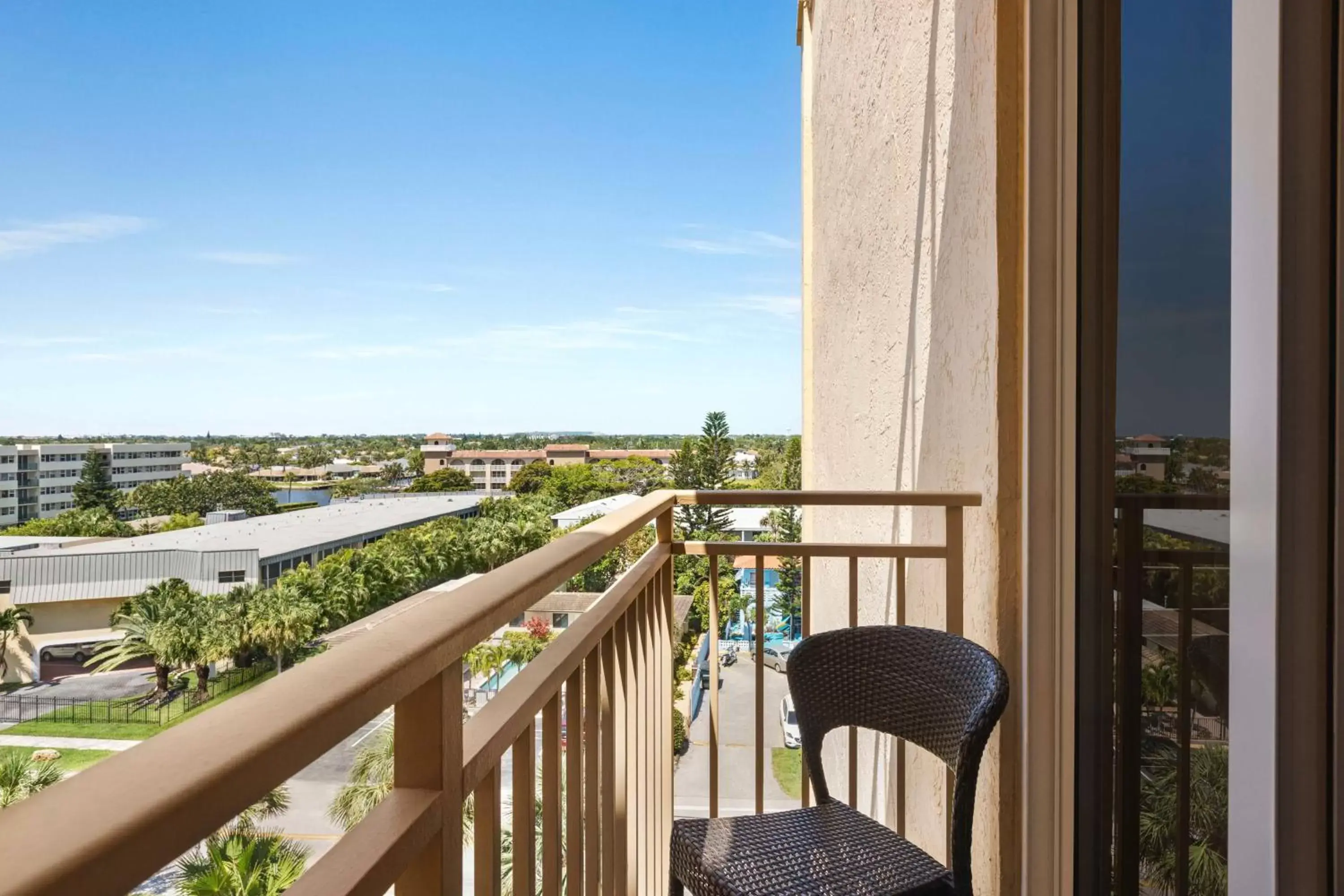Living room, Balcony/Terrace in Embassy Suites by Hilton Deerfield Beach Resort & Spa
