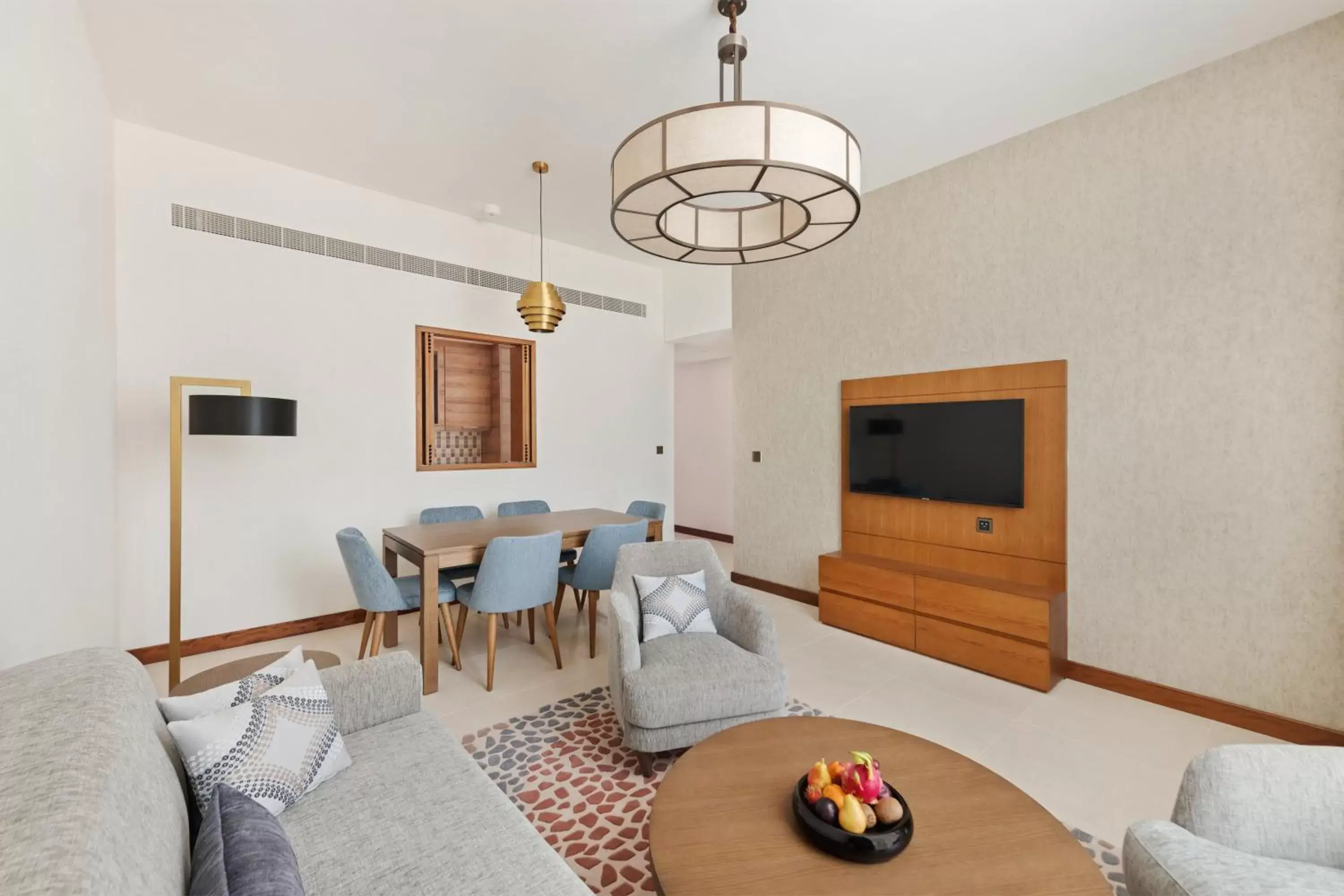 Bedroom, Seating Area in Staybridge Suites Dubai Al-Maktoum Airport, an IHG Hotel