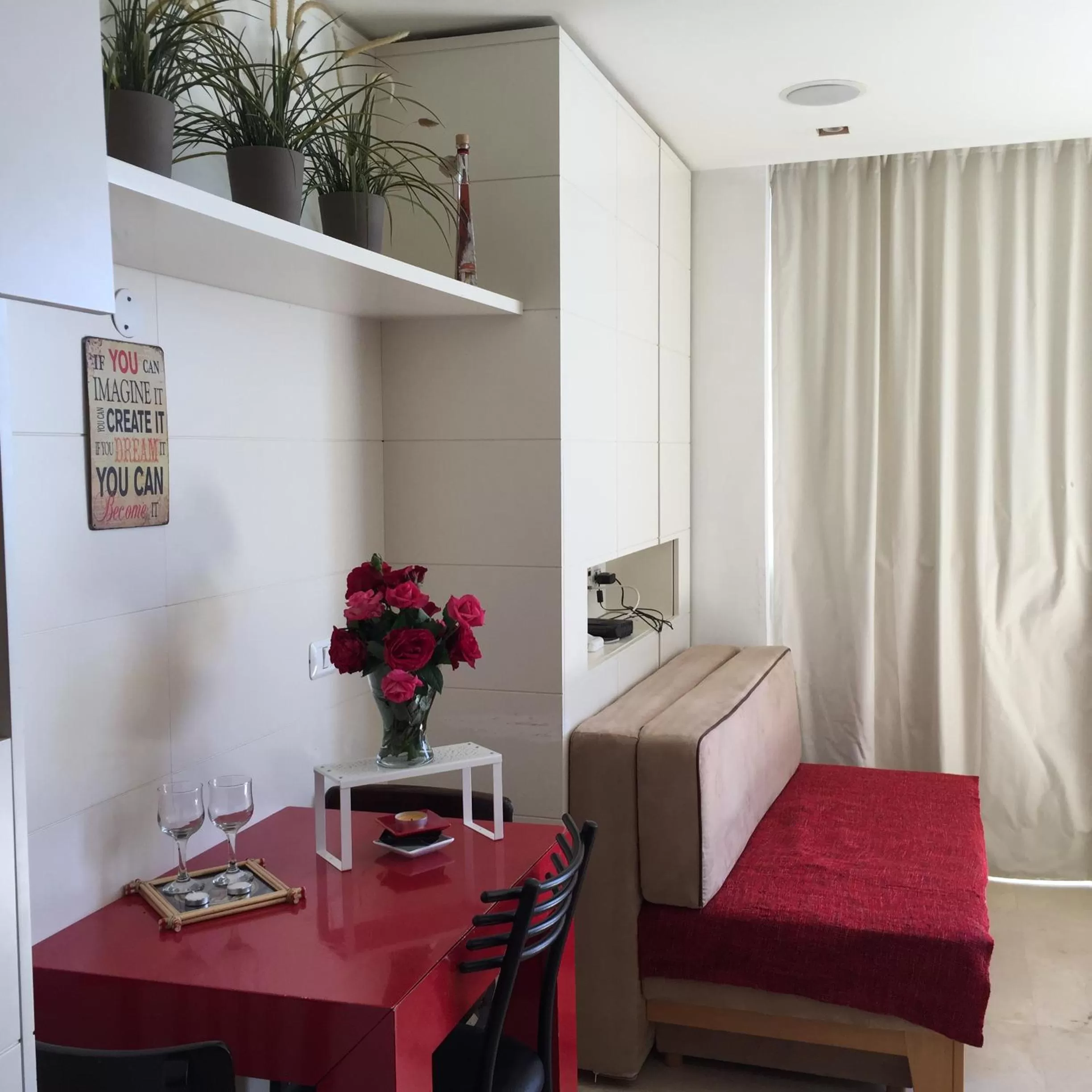 Seating area, Bed in Raphael Apartments