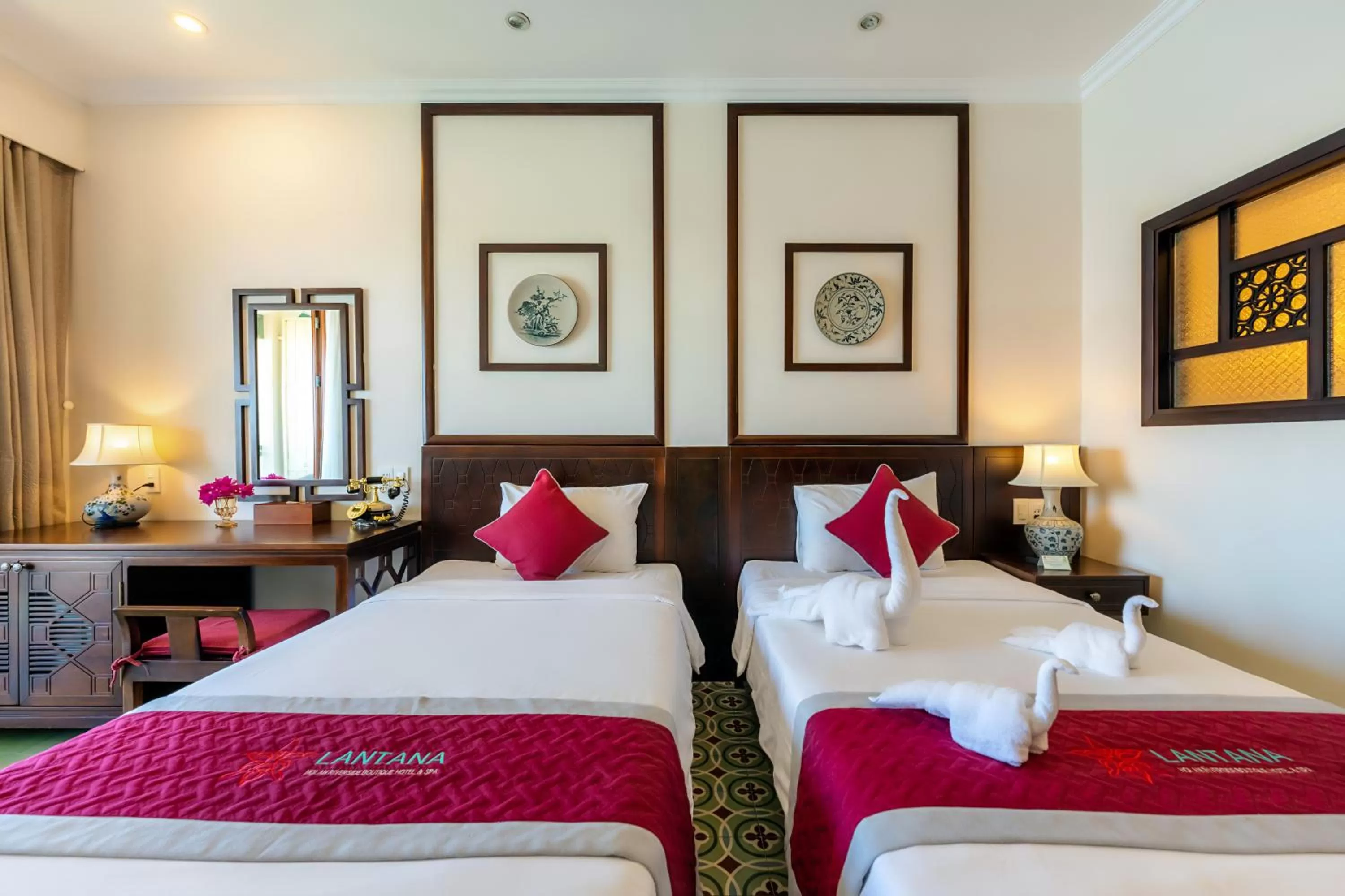 Bed in Lantana Riverside Hoi An Boutique Hotel & Spa