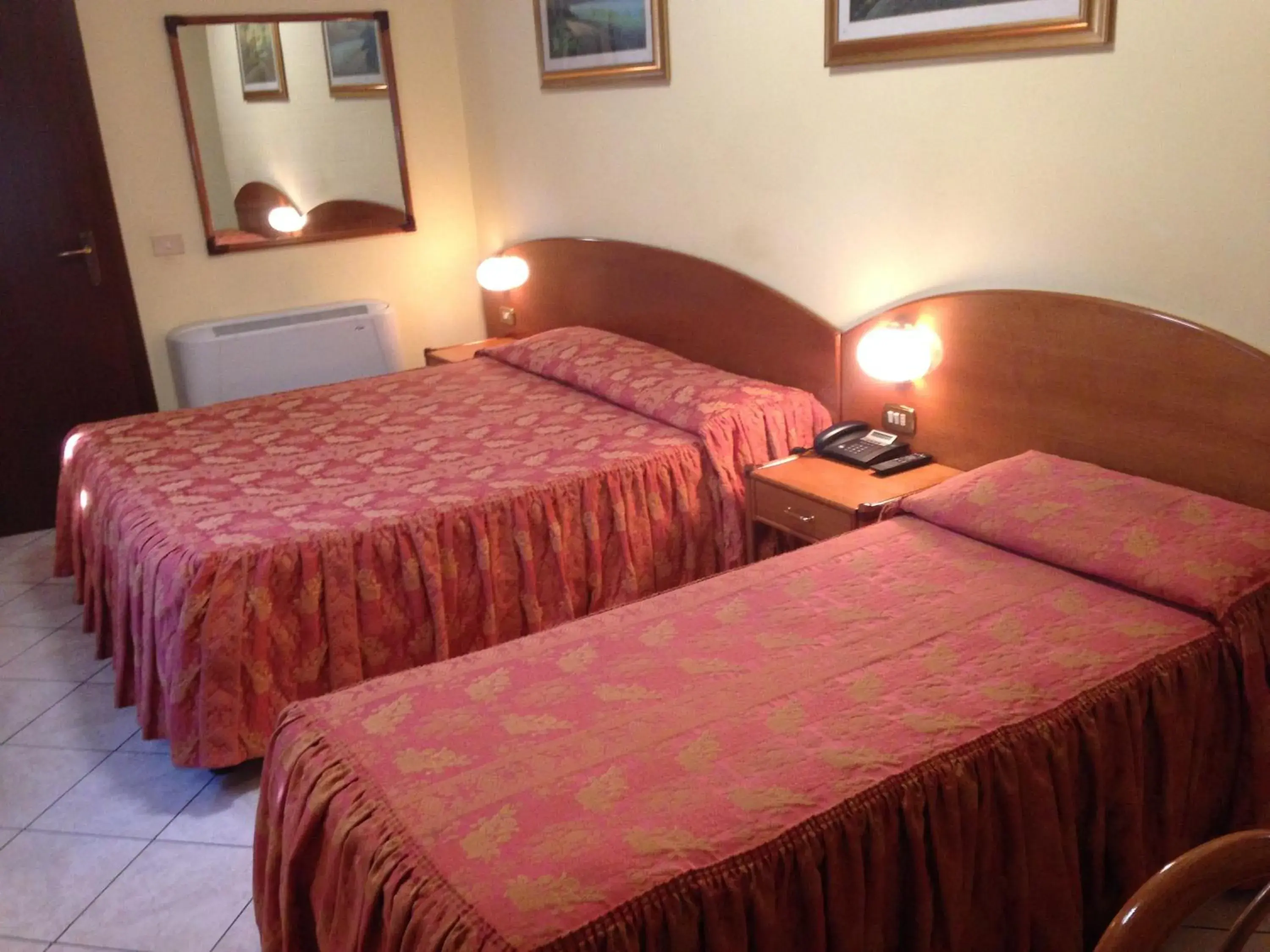 Bed in Hotel La Caravella