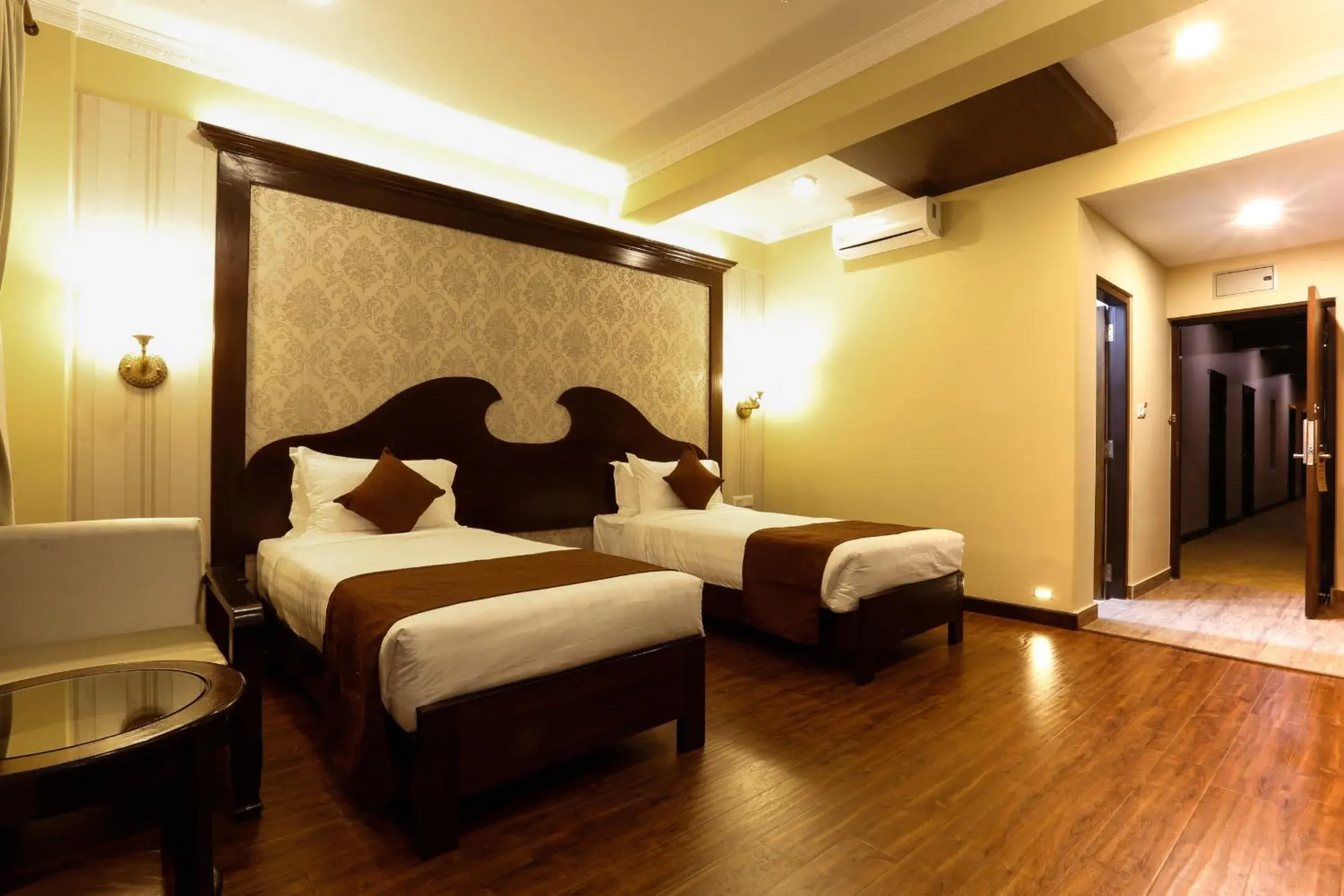 Bed in Da Yatra Courtyard Hotel