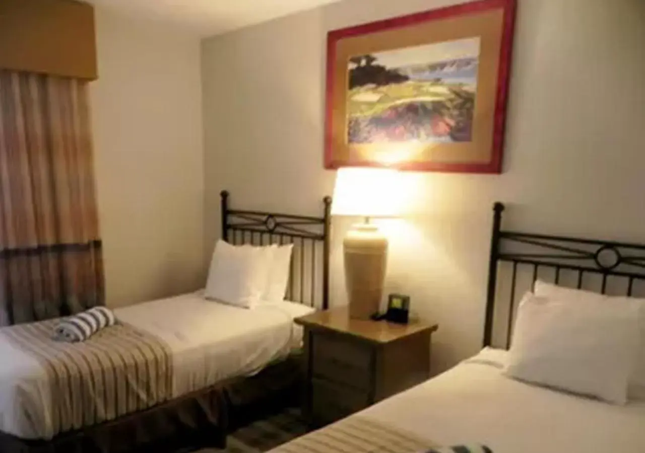 Bed in Vista Mirage Resort