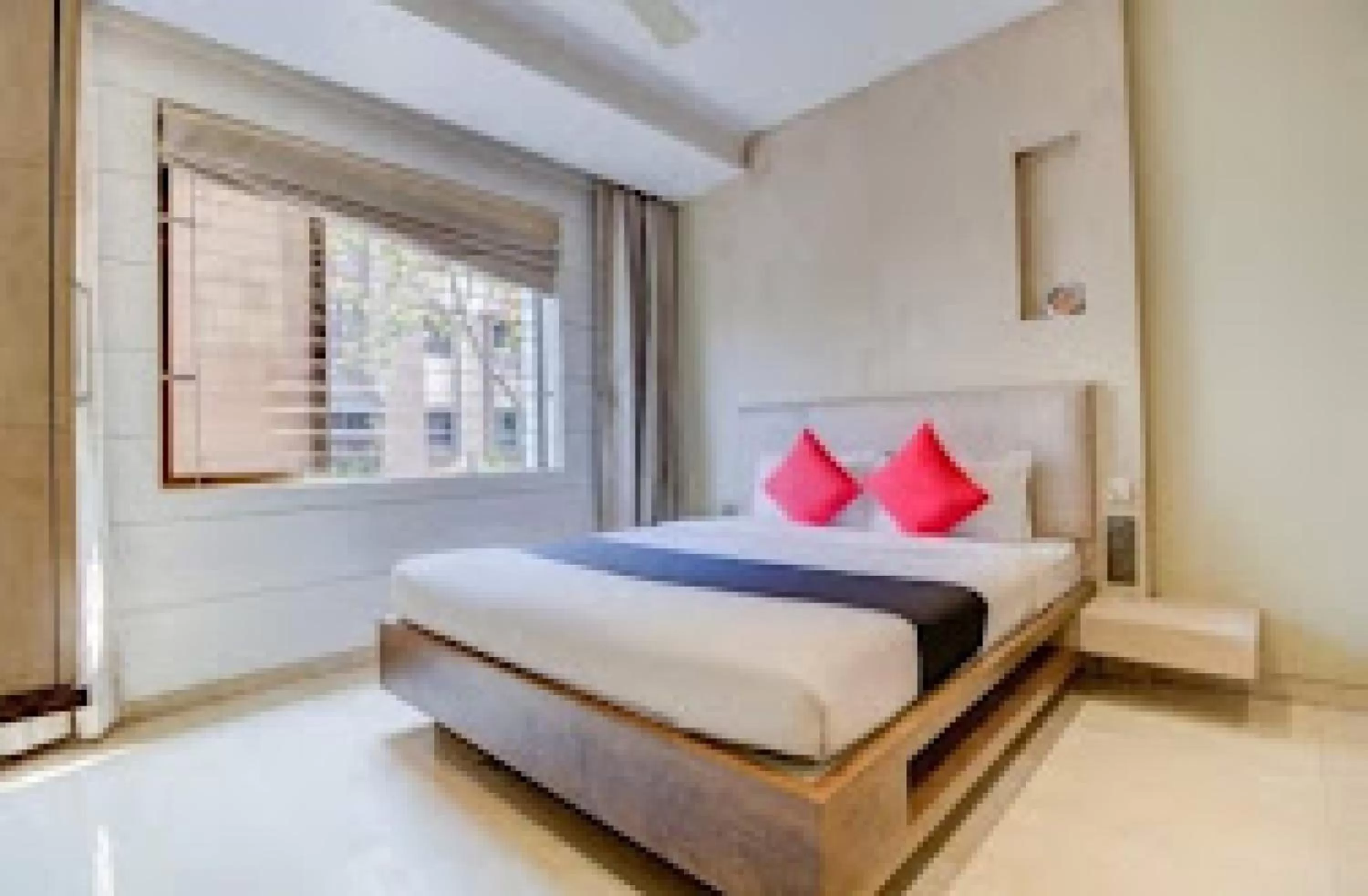 Bed in HOTEL PRATIKSHA RESIDENCY