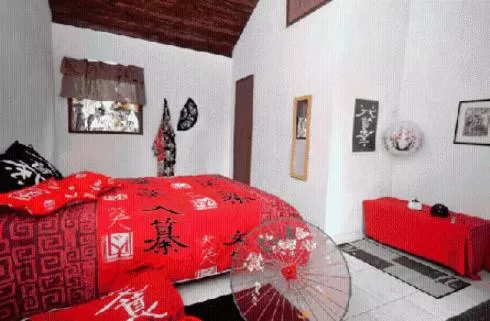 Bed in Pousada A Marca do Faraó