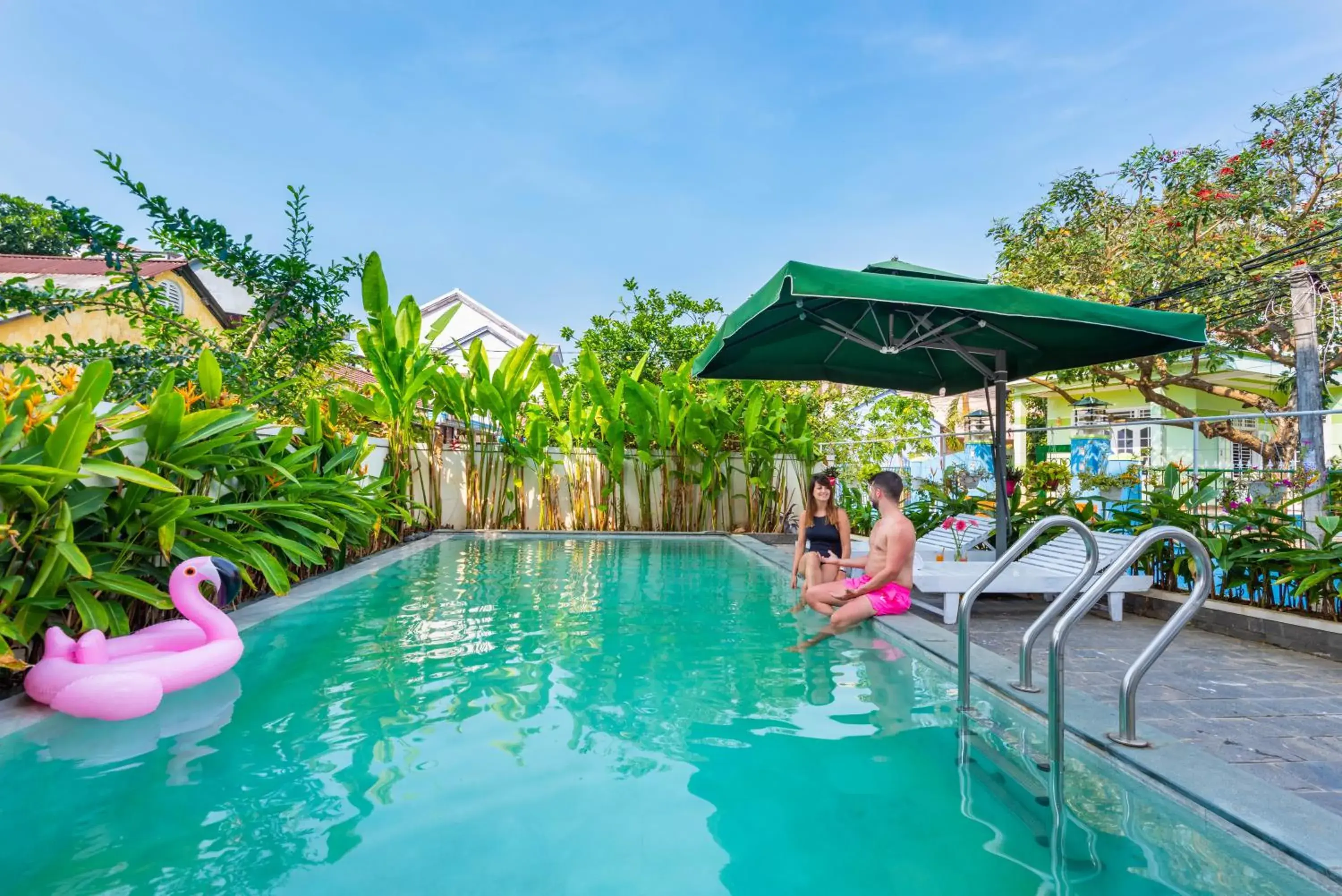 Swimming pool in Flamingo Villa Homestay - Big Rooms with Balcony - Close to Hoi An Old Town 200m & Temple Bridge - Large Outside Pool for Sun Bathing Swimming pool in Flamingo Villa Homestay - Big Rooms with Balcony - Close to Hoi An Old Town 200m & Temple Bridge - Large Outside Pool for Sun Bathing