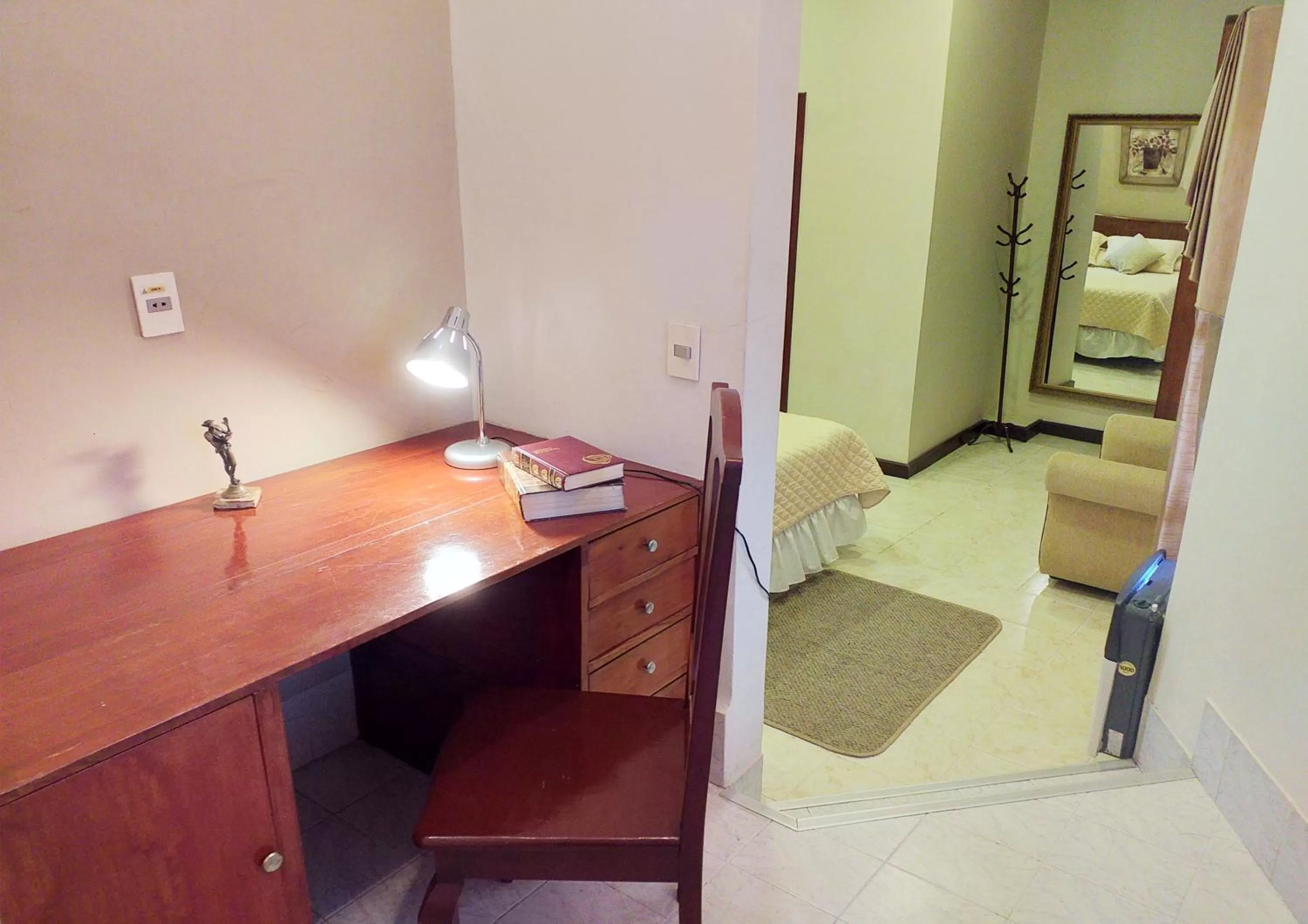 Seating area, Bed in Hotel Carmen