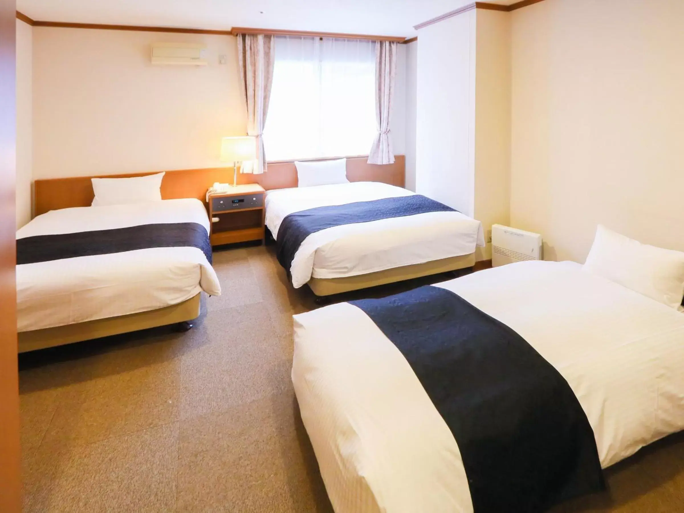 Bed in APA Hotel Sapporo Susukino Ekinishi