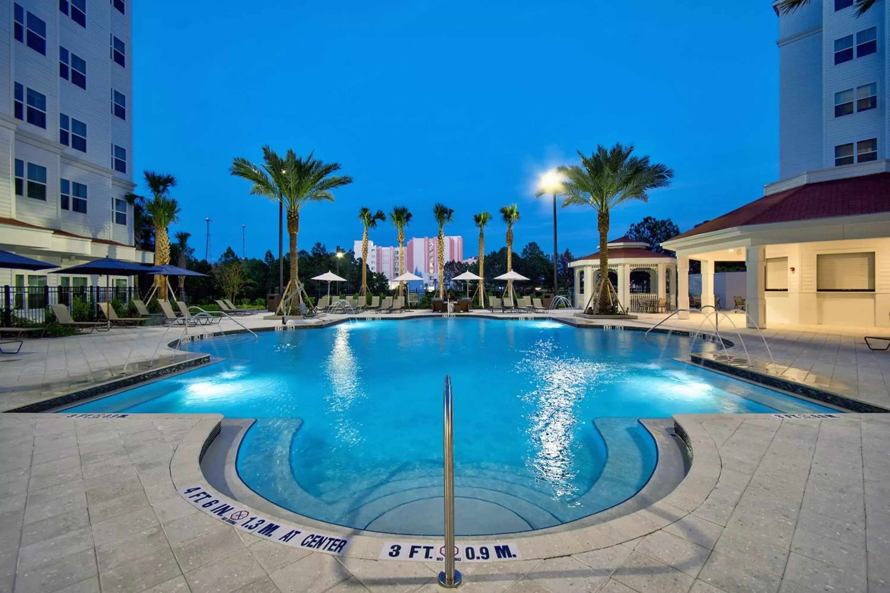 Swimming Pool in Residence Inn by Marriott Orlando at FLAMINGO CROSSINGS Town Center
